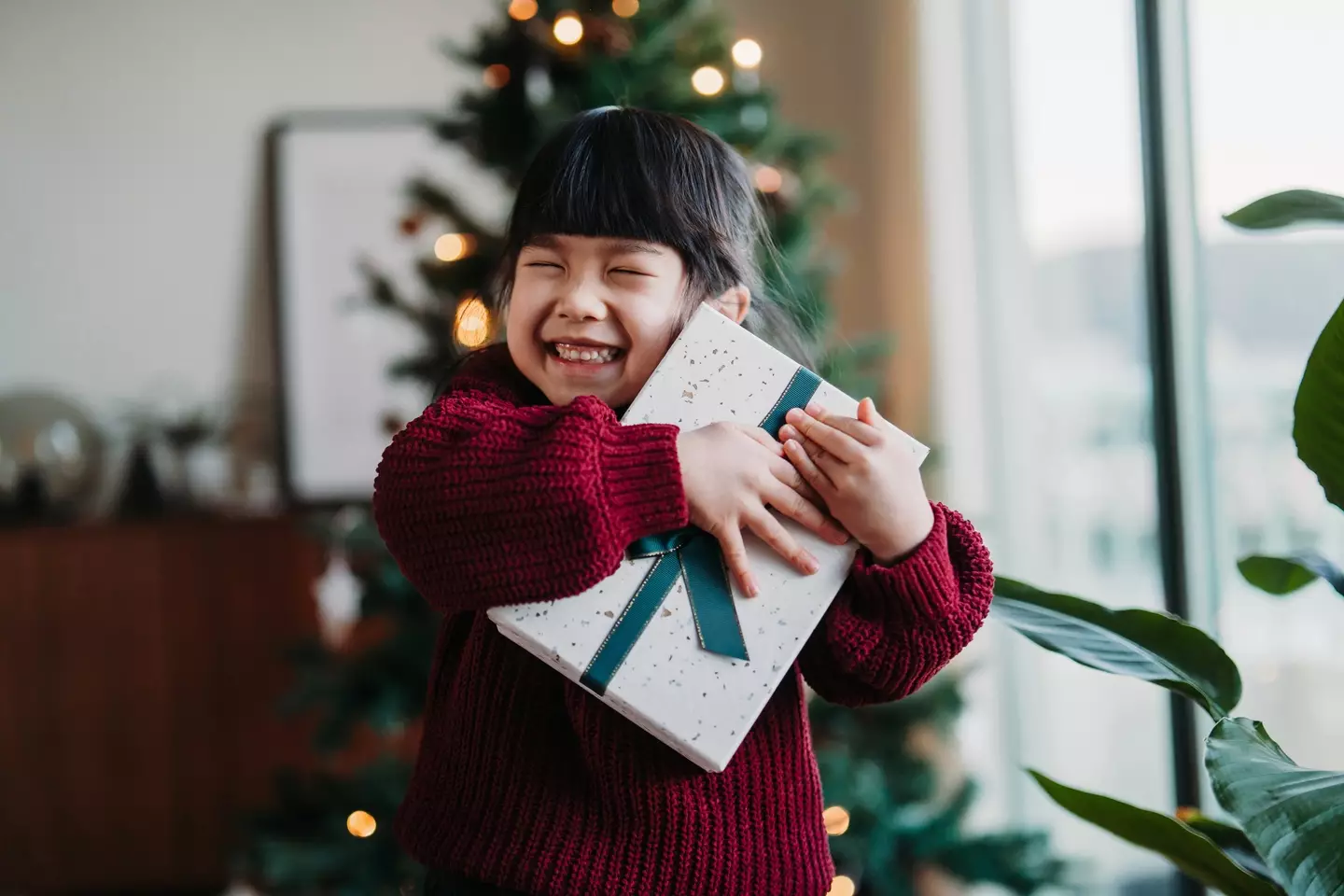 Maybe kids don't need to believe in Santa to be happy at Christmas after all (Getty Stock Image)