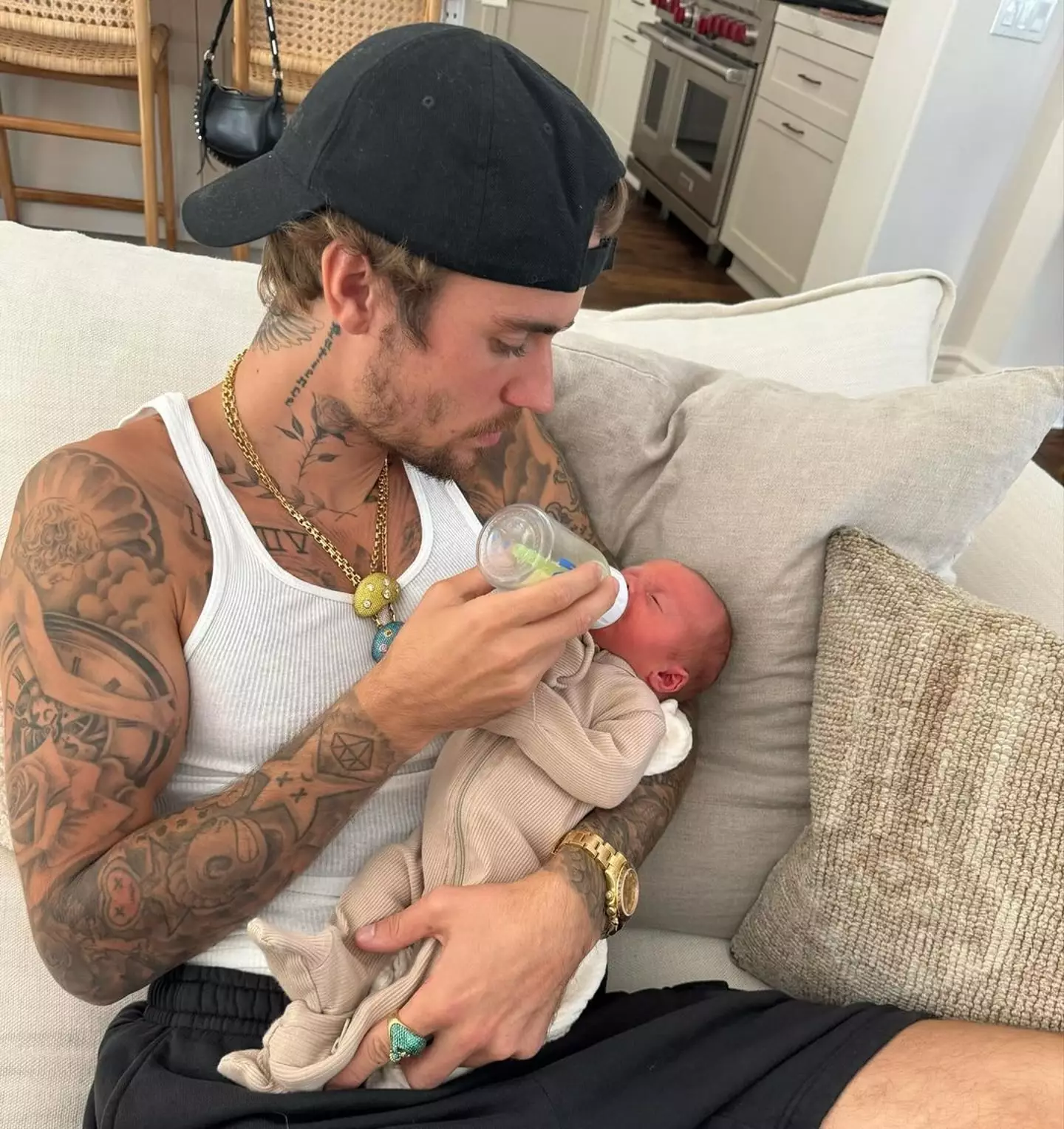 Justin Bieber took to Instagram to share two pictures cradling a newborn baby.