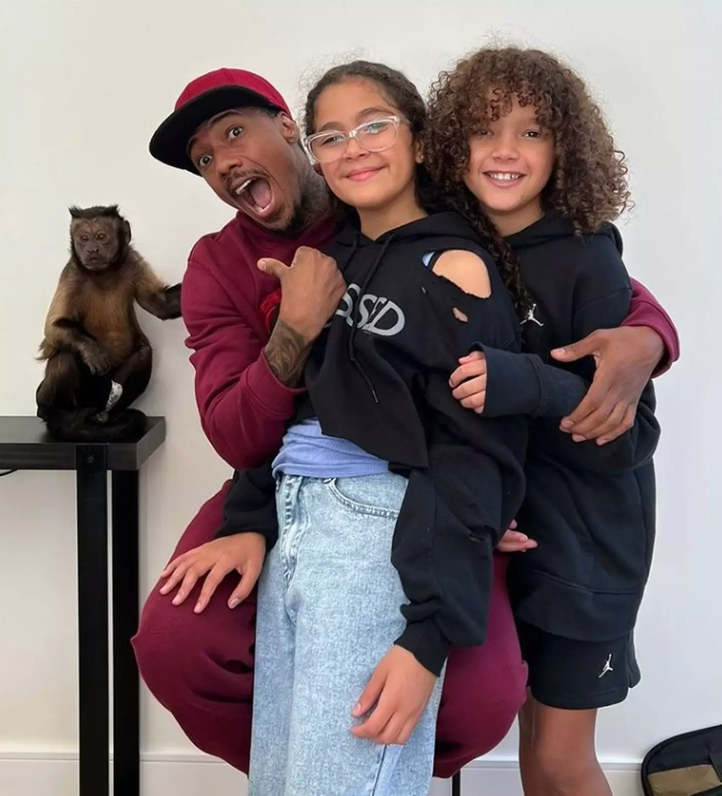 Cannon pictured with his 11-year-old twins Moroccan and Monroe, who he shares with ex-wife Mariah Carey.