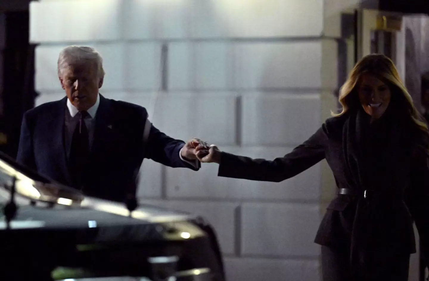 There's been a lot of comments online of the displays of affection shown between Donald and Melania Trump (ROBERTO SCHMIDT/AFP via Getty Images)