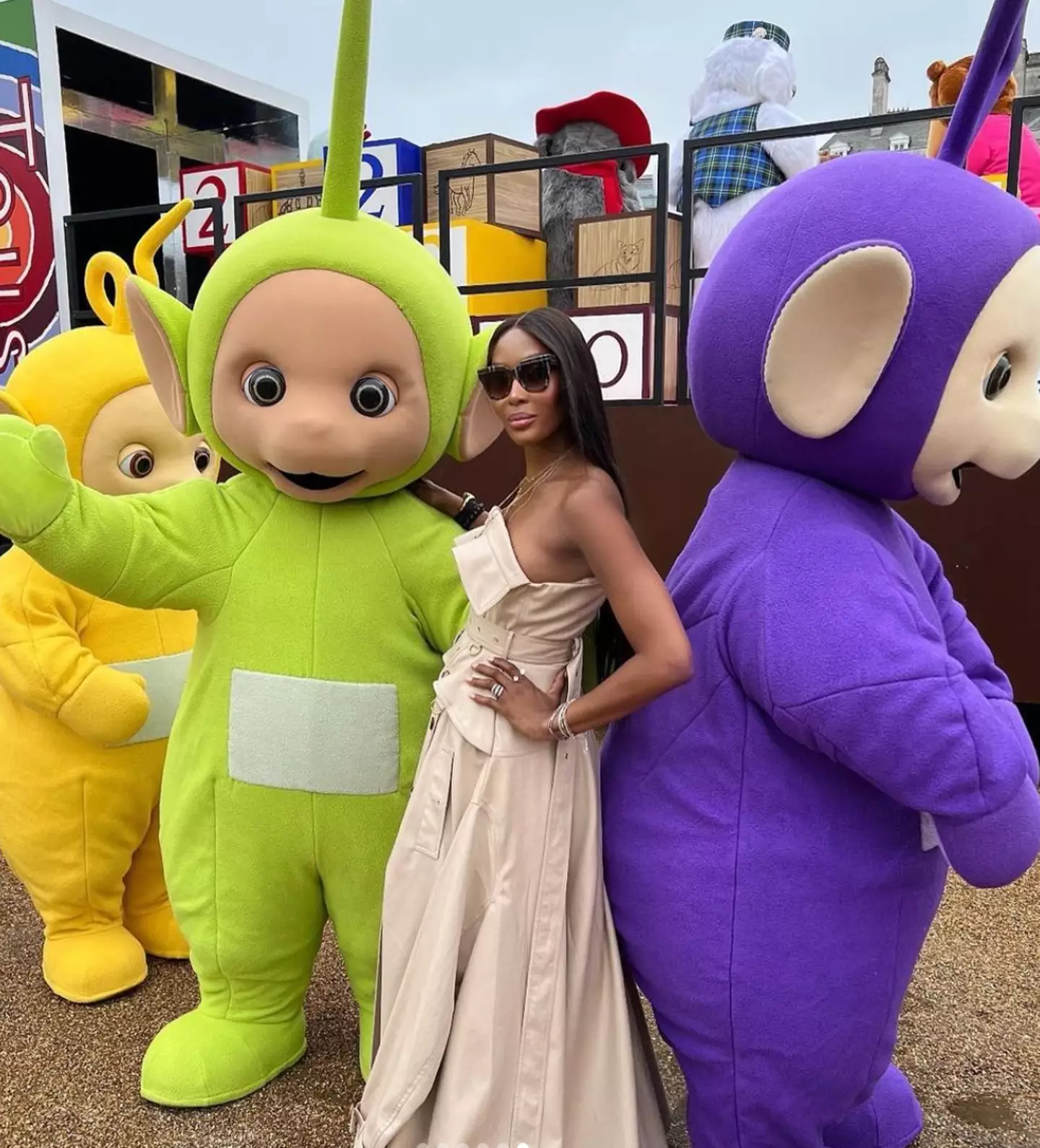 Naomi could be seen posing with the Teletubbies.