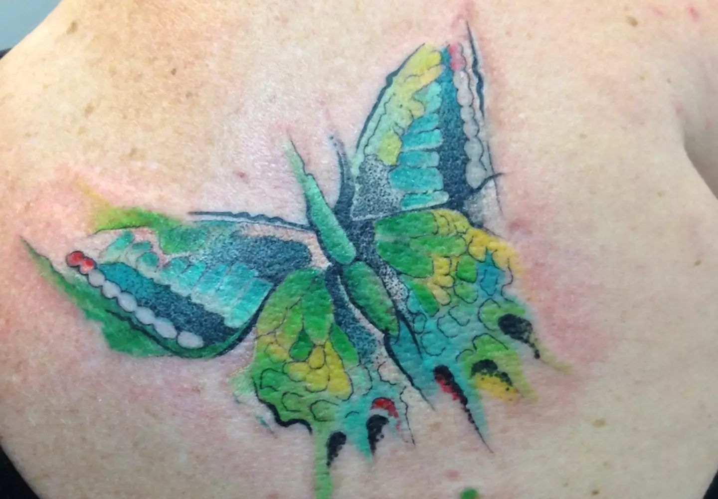 The daughter got a butterfly tattoo on her shoulder.