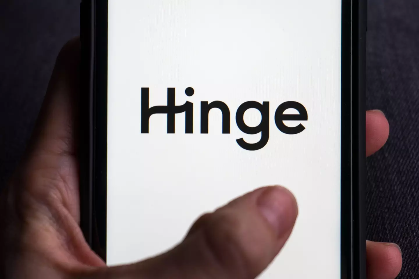 The woman met this man through Hinge (