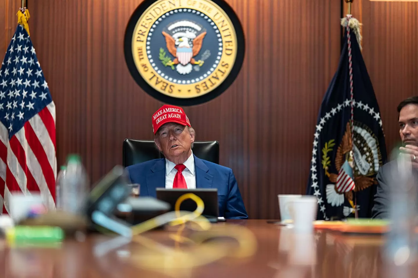 A new series of pictures of Trump that were released by the White House this week have sparked conspiracy theories (Handout / Getty Images)
