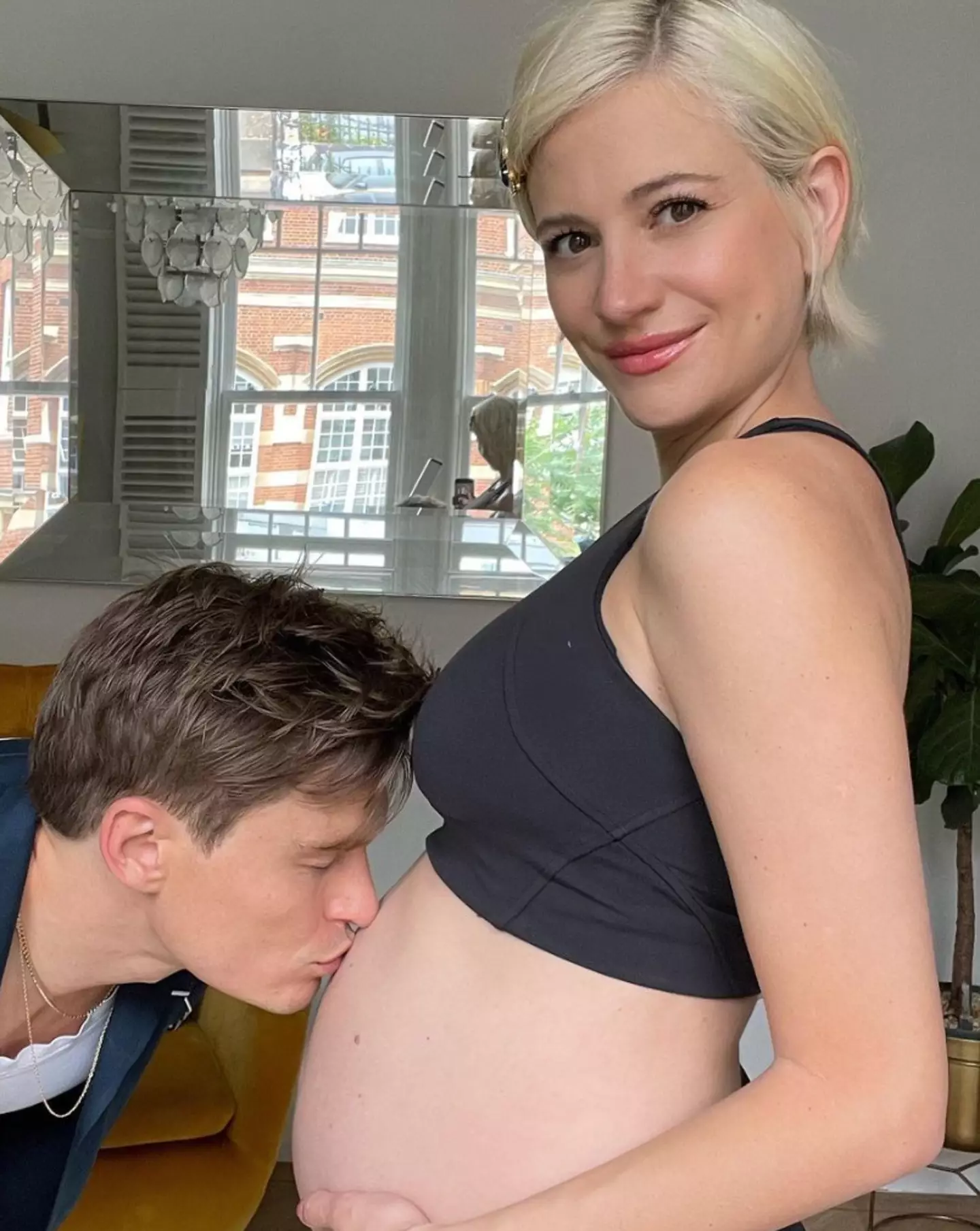 The singer showed off her growing bump in a series of snaps.