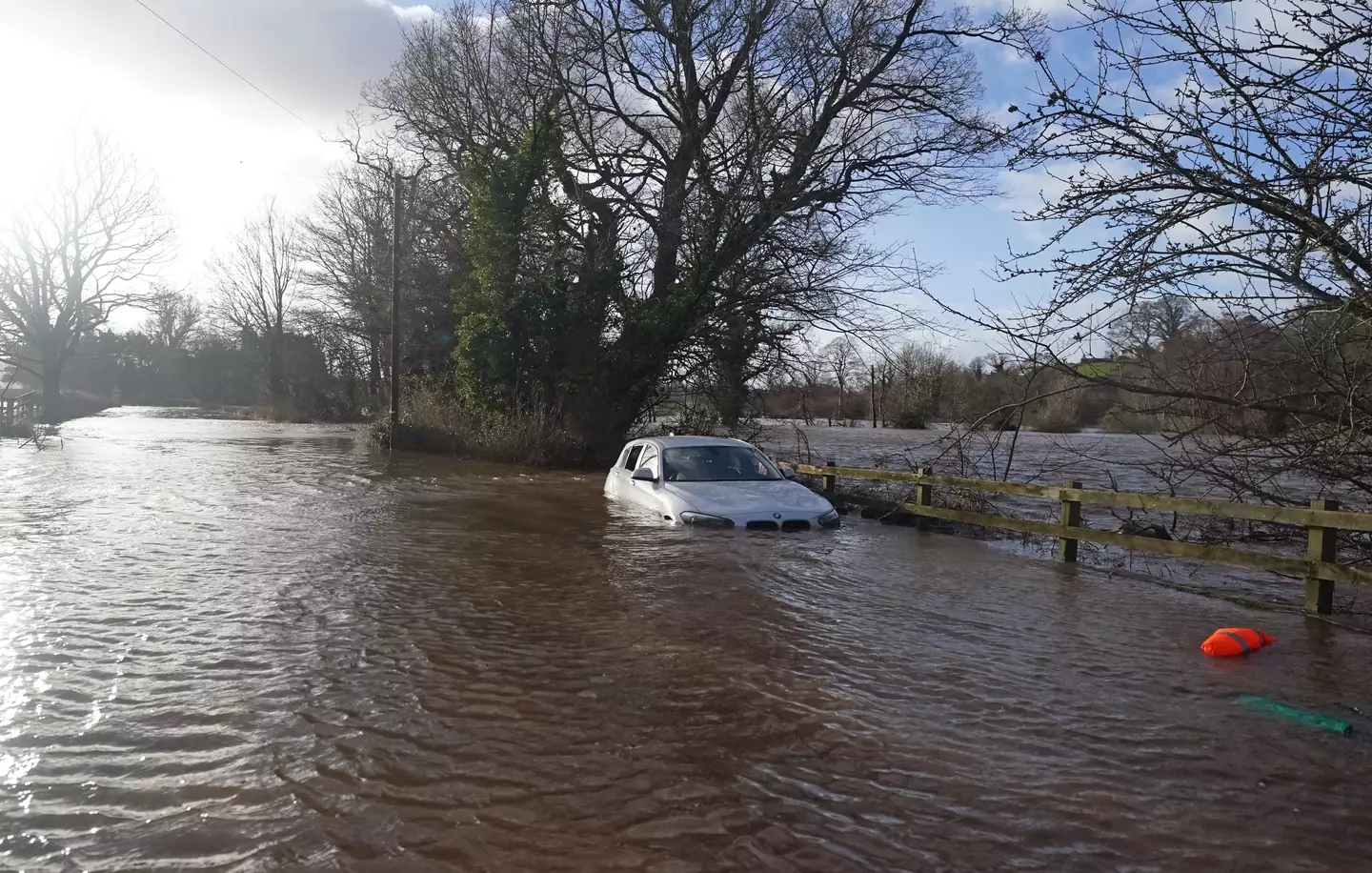 A car stranded in flood water in Warwick bridge in Cumbria.