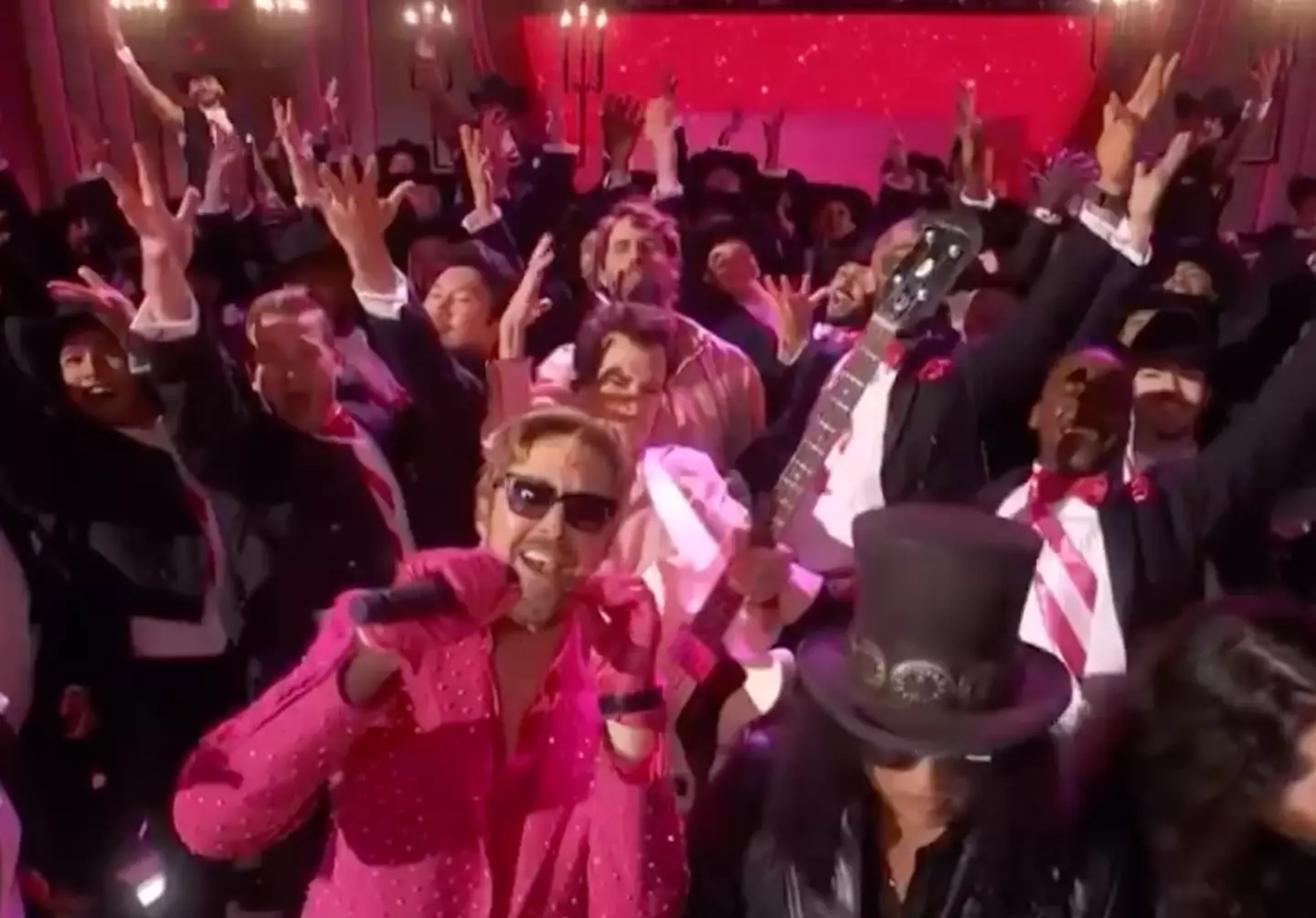 Ryan Gosling kissed his Barbie themed 'E' necklace as a tribute to Eva Mendes.