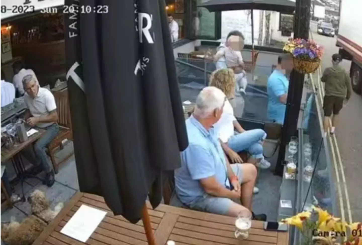 CCTV footage shows two men leaving the pub.