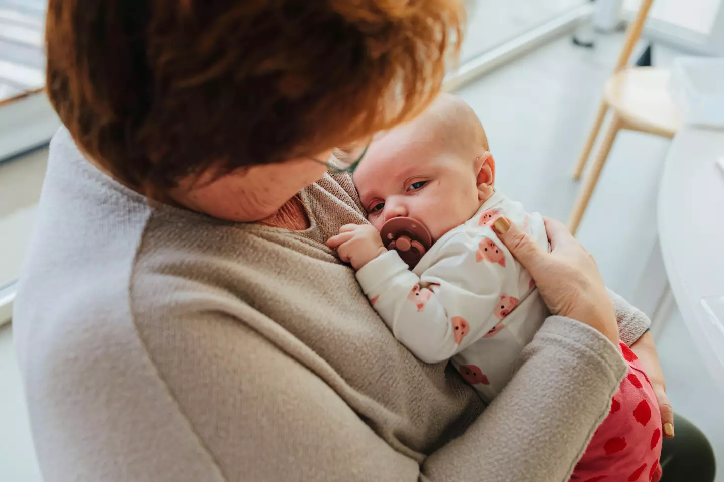 Grandparents asking permission for hugs helps teach kids consent.