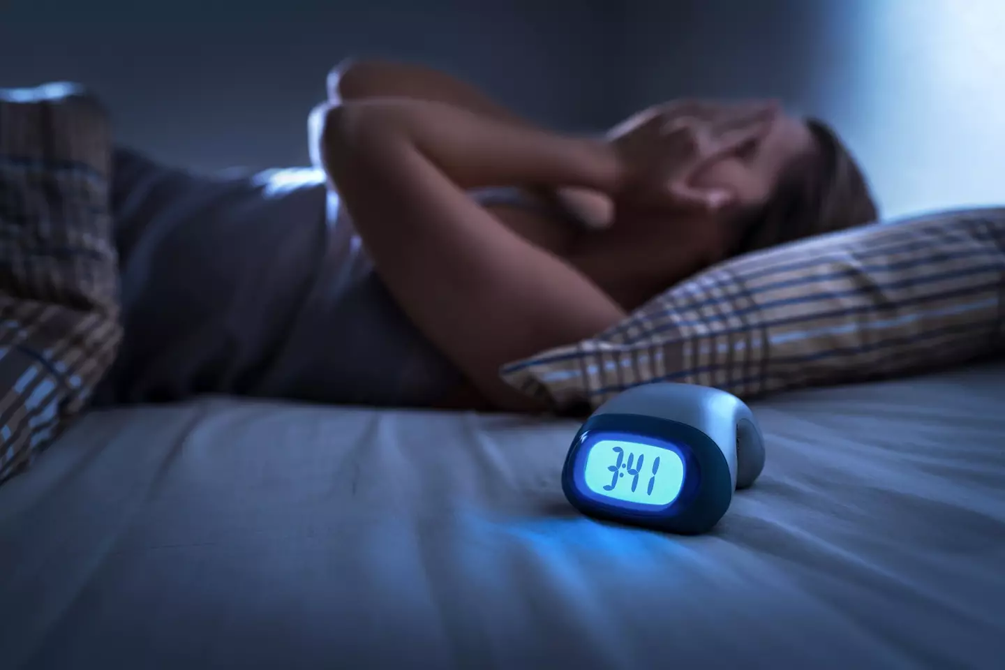 Scientists have revealed there's actually a reason why we're more anxious and impulsive at night time (Getty Stock Image)