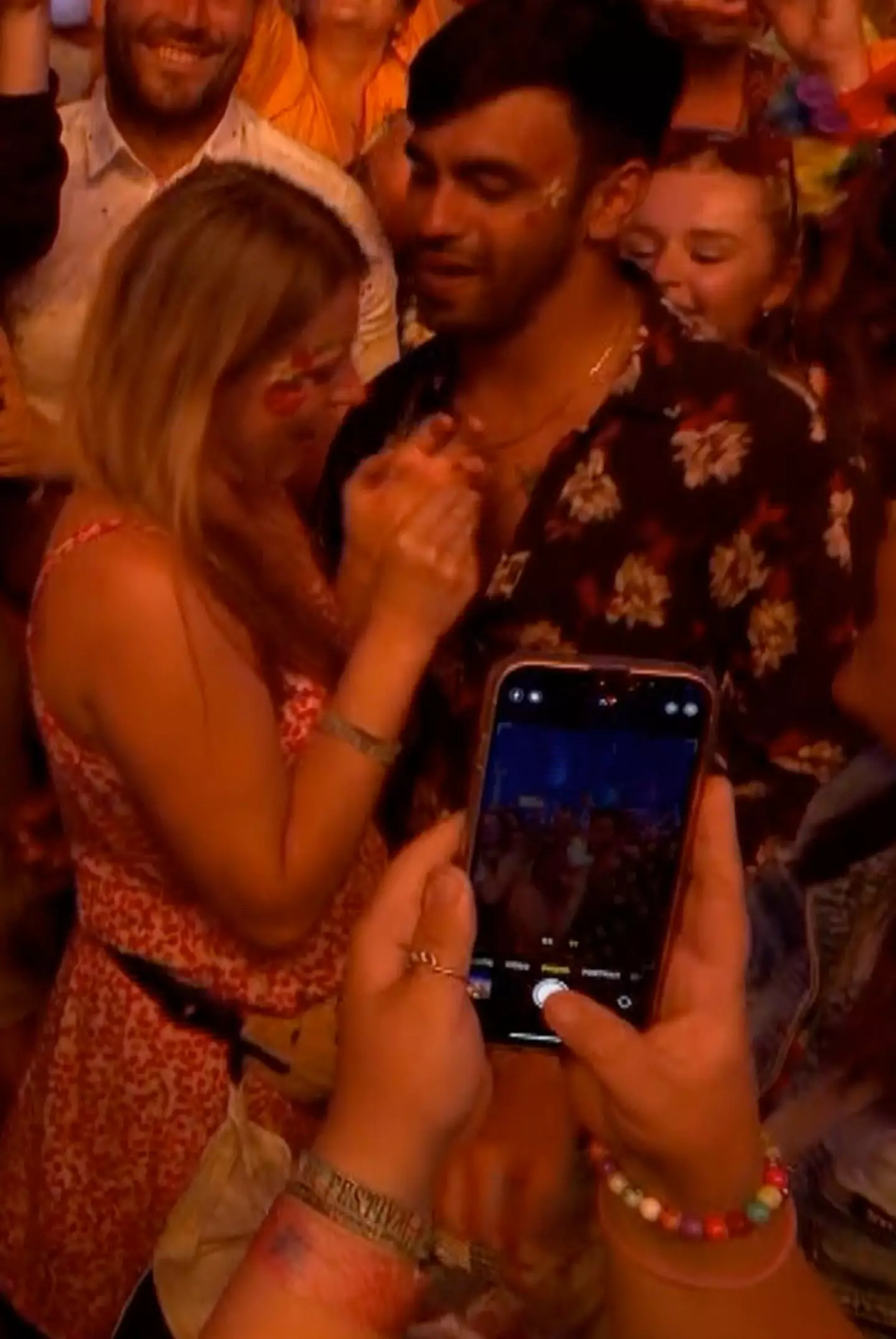 Viewers spotted one couple seemingly getting engaged during Elton's set.