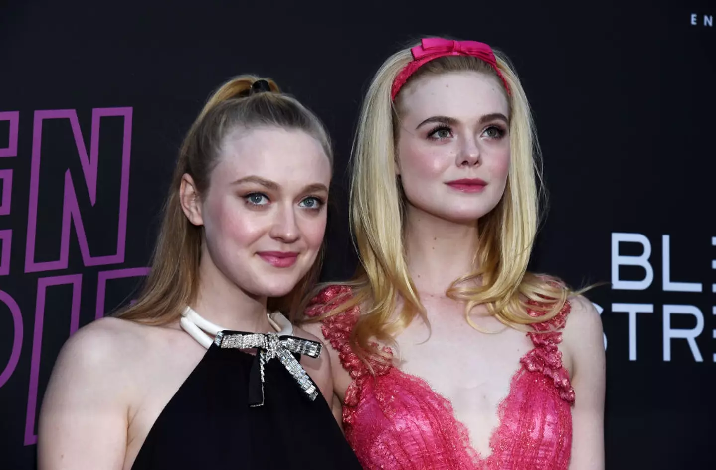 The Fanning sisters allegedly share a very distant relative with the monarch. (Amanda Edwards / Stringer / Getty Images)