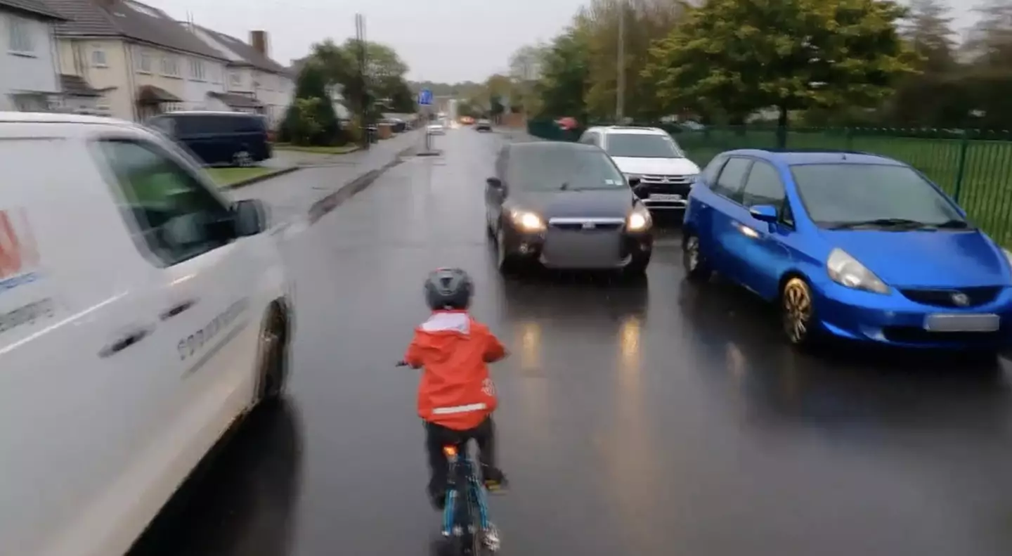 Some have blamed the father for letting his child cycle on the road.