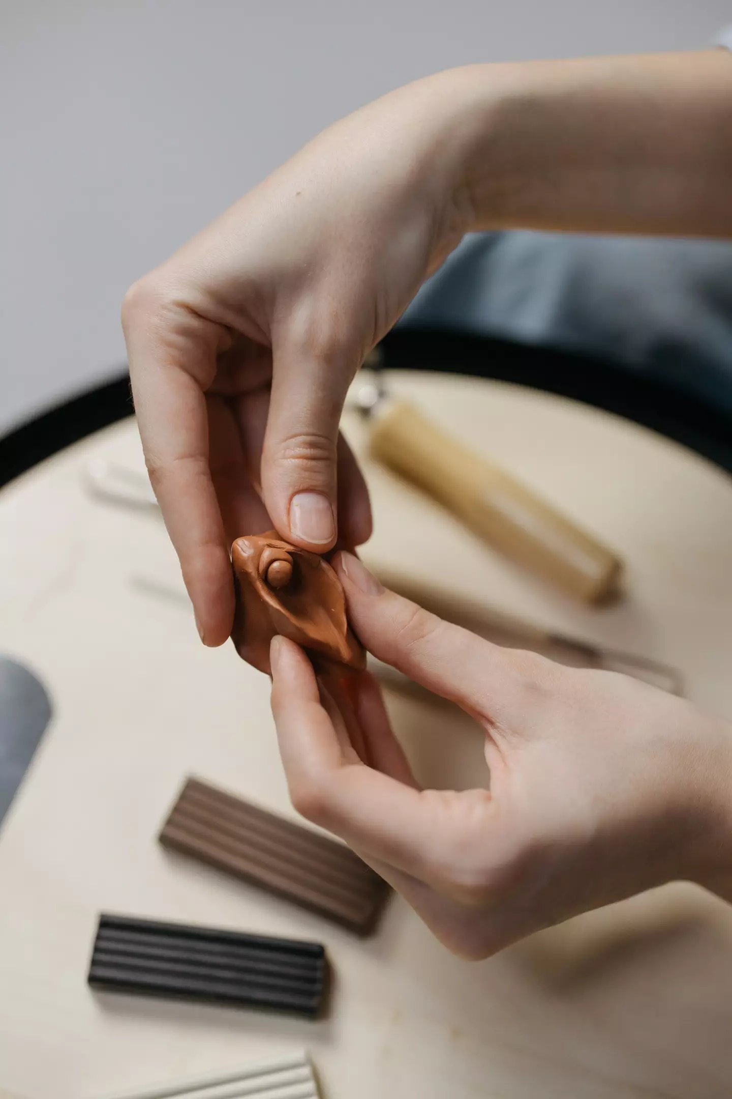 Clay model of female genitalis - Cottonbro on Pexels