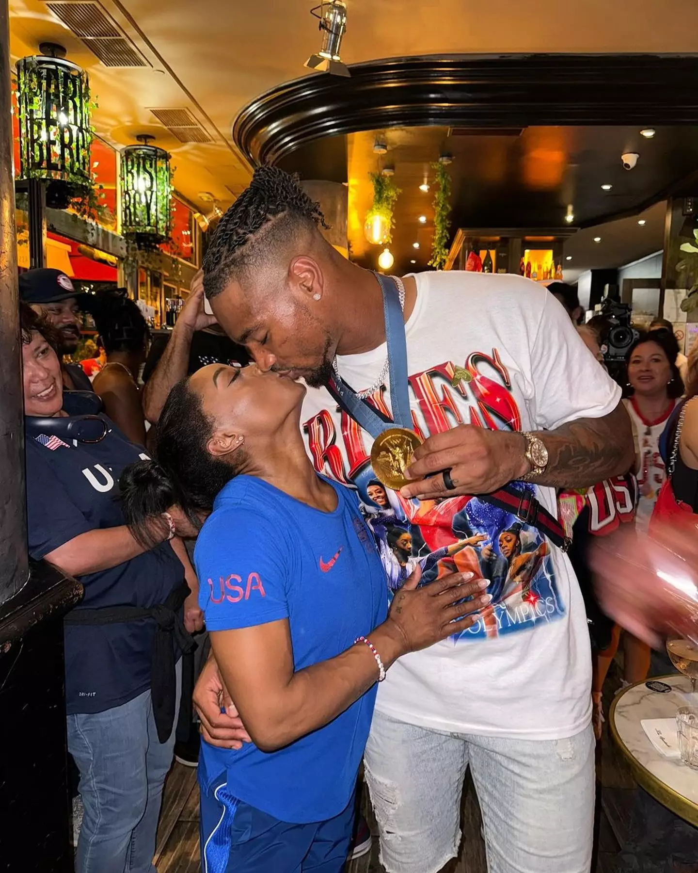 Some people found it strange he chose to wear her medal (Instagram/@jowens)