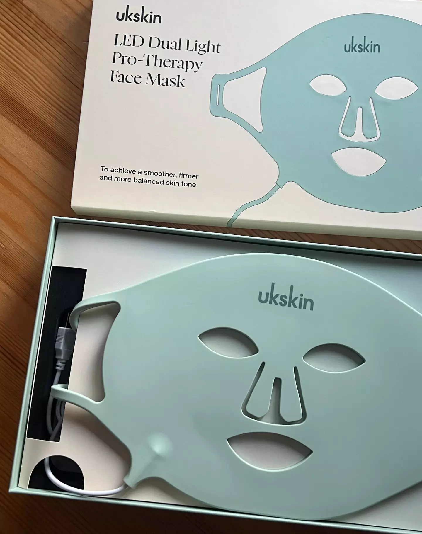 Unboxing the LED face mask (Photo: LADbible Group)