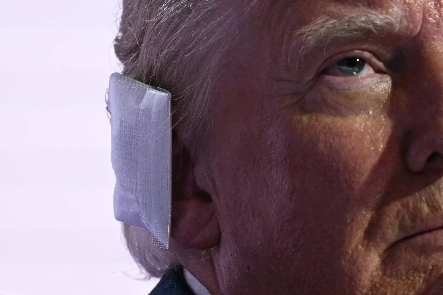 The President claimed he'd been shot in the ear (BRENDAN SMIALOWSKI/AFP via Getty Images)