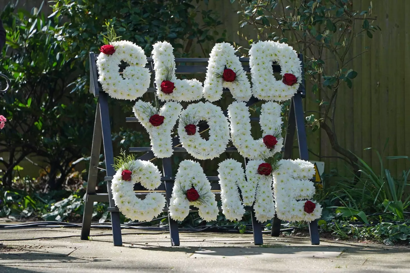 A floral tribute outside St Francis of Assisi church ahead of the funeral of The Wanted star Tom Parker (