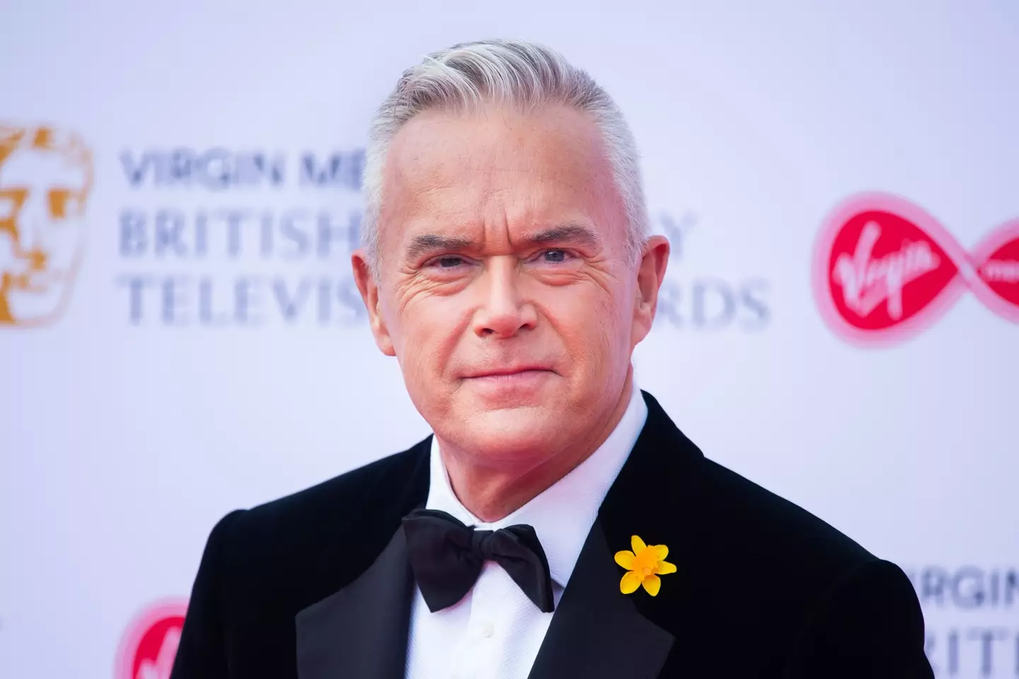 Former BBC presenter Huw Edwards, 62, has been charged with three counts of making indecent images of children. (PA)