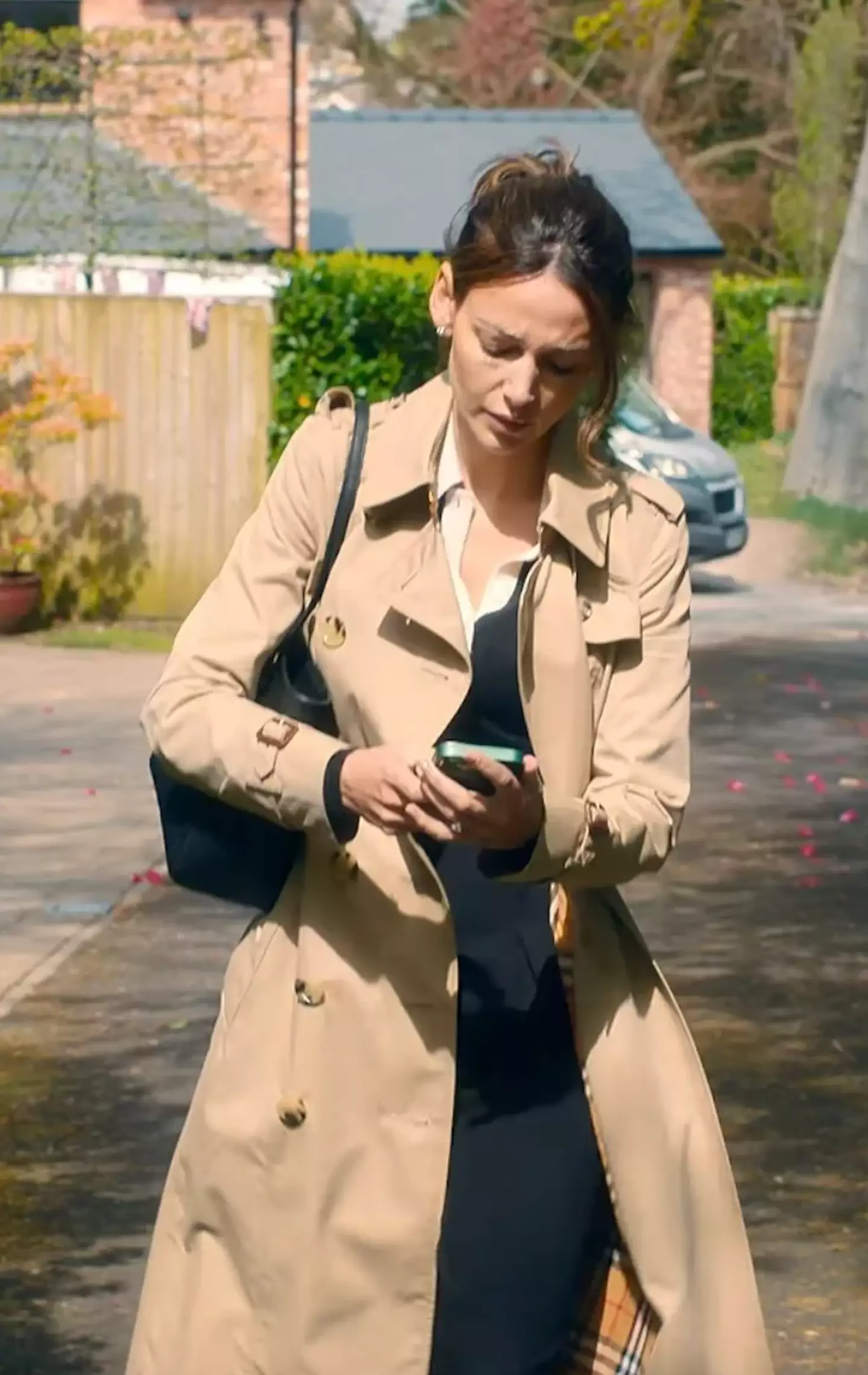 Her Burberry trench coat will set you back almost £2,000.