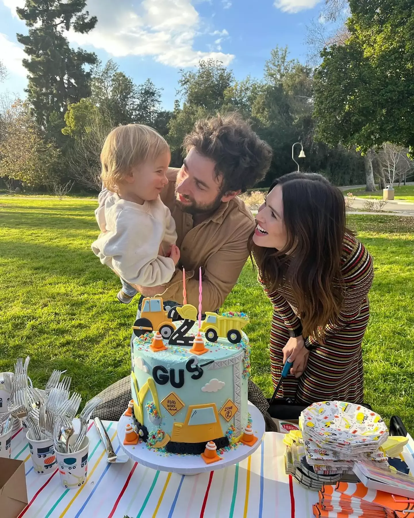 Moore with Gus and her husband Taylor Goldsmith.