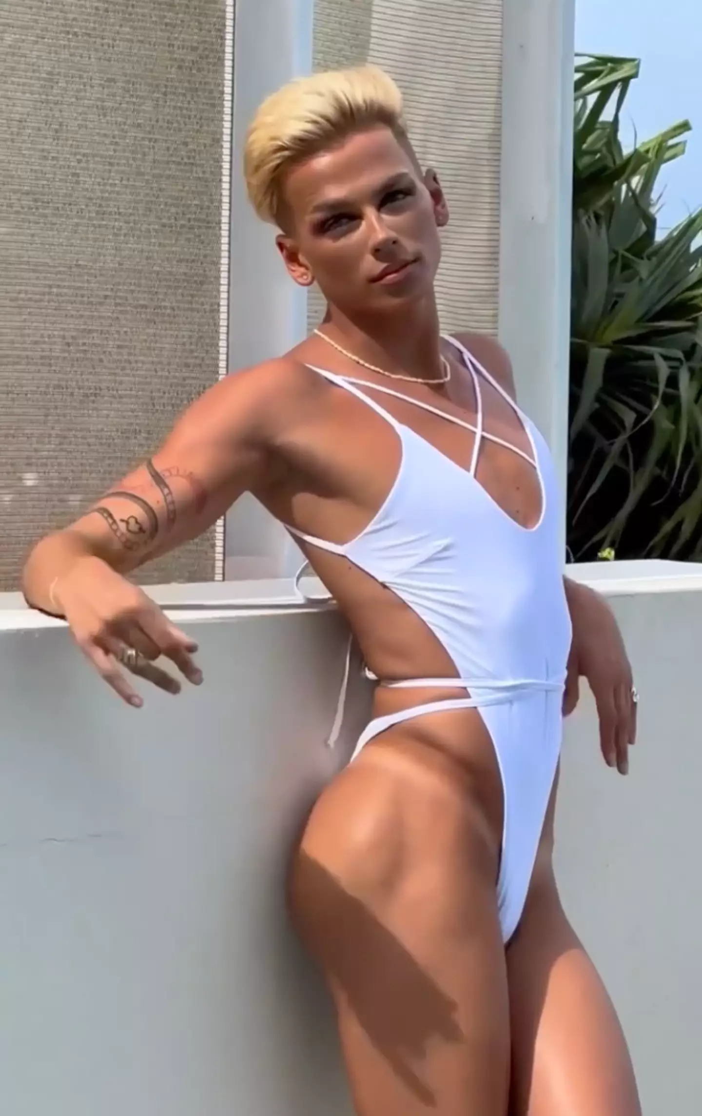 The video showed model Jake Young as he posed in the ‘Sugar Slinky One-Piece'.