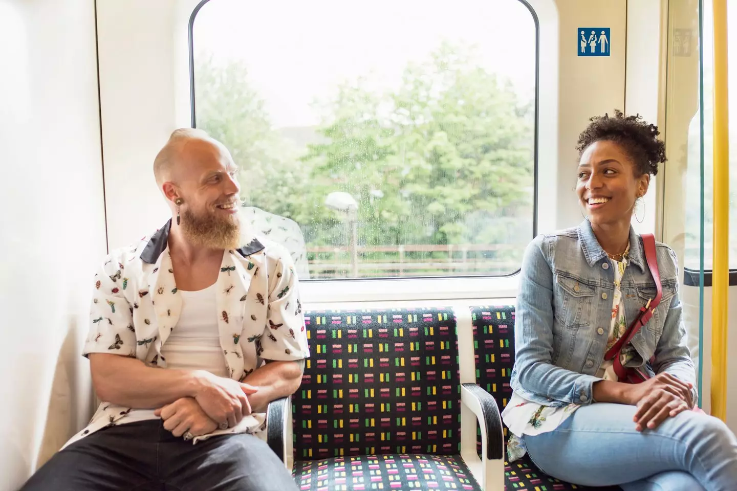 Couple flirting on train (Flashpop / Getty Images)