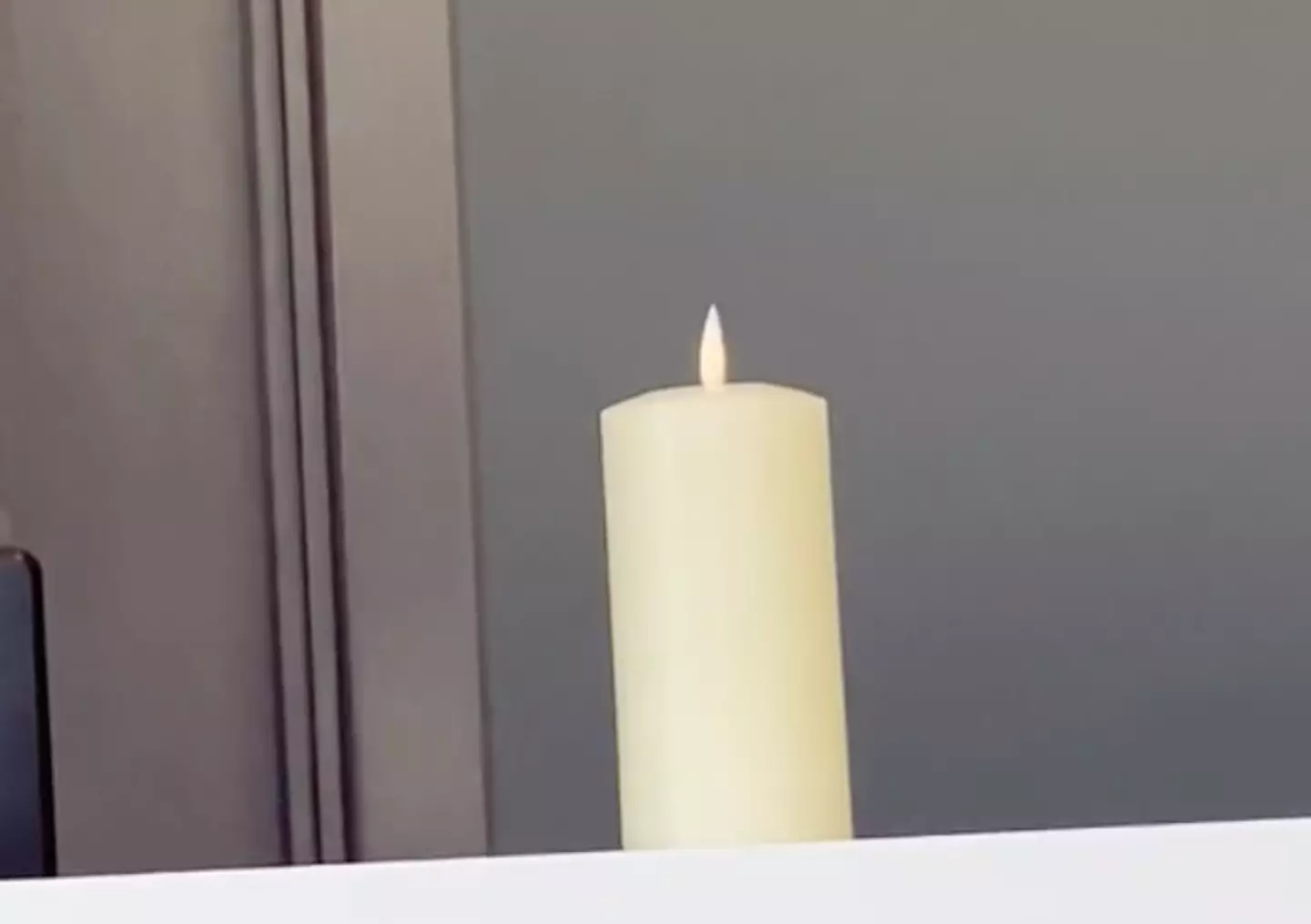 A candle was lit on the reception desk.