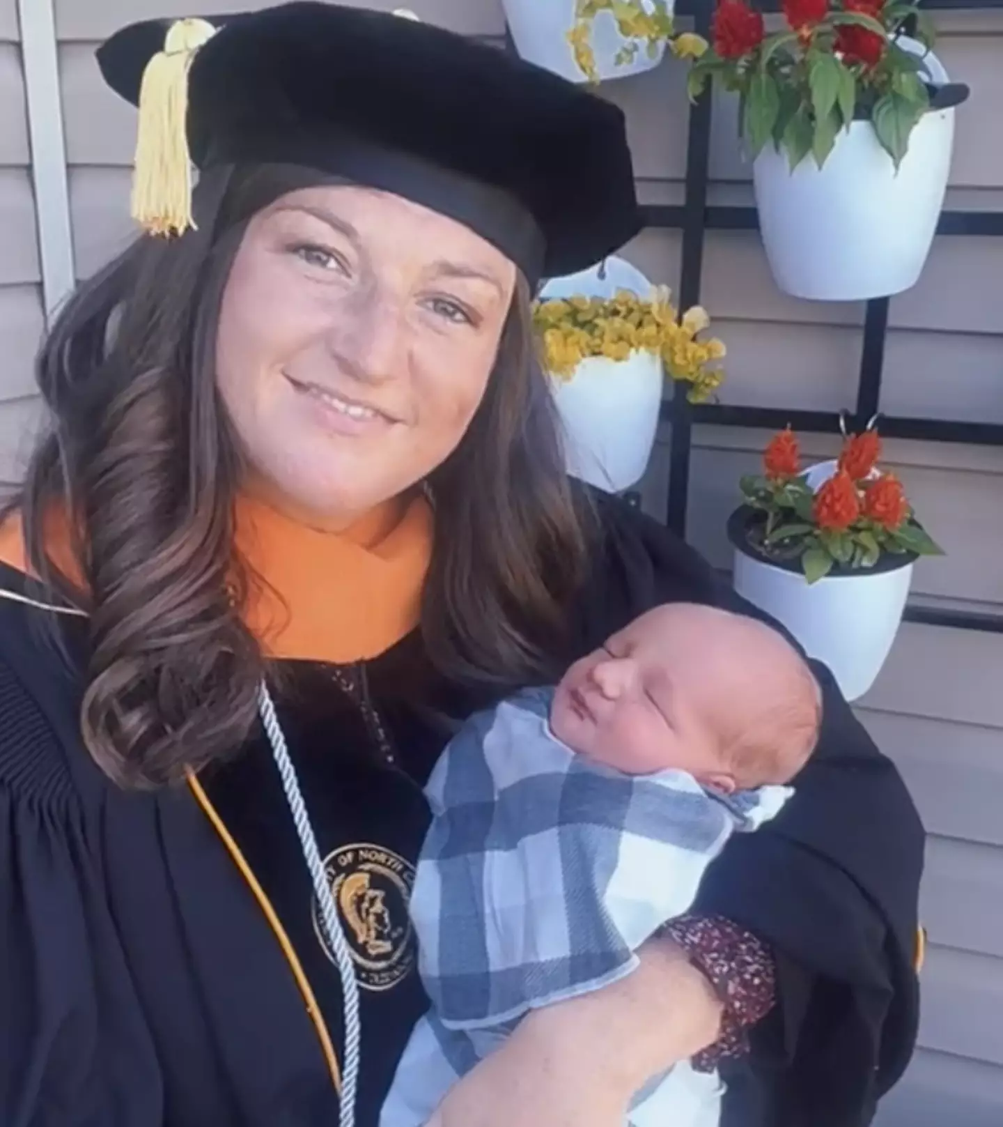 Bailiff's husband and newborn son watched the graduation ceremony via FaceTime.