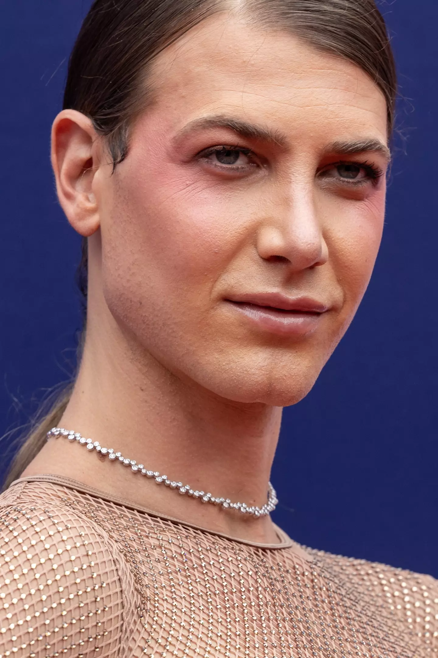 Aussie model, Christian Wilkins, has issued a response to critics slamming him over his 'nude' dress.