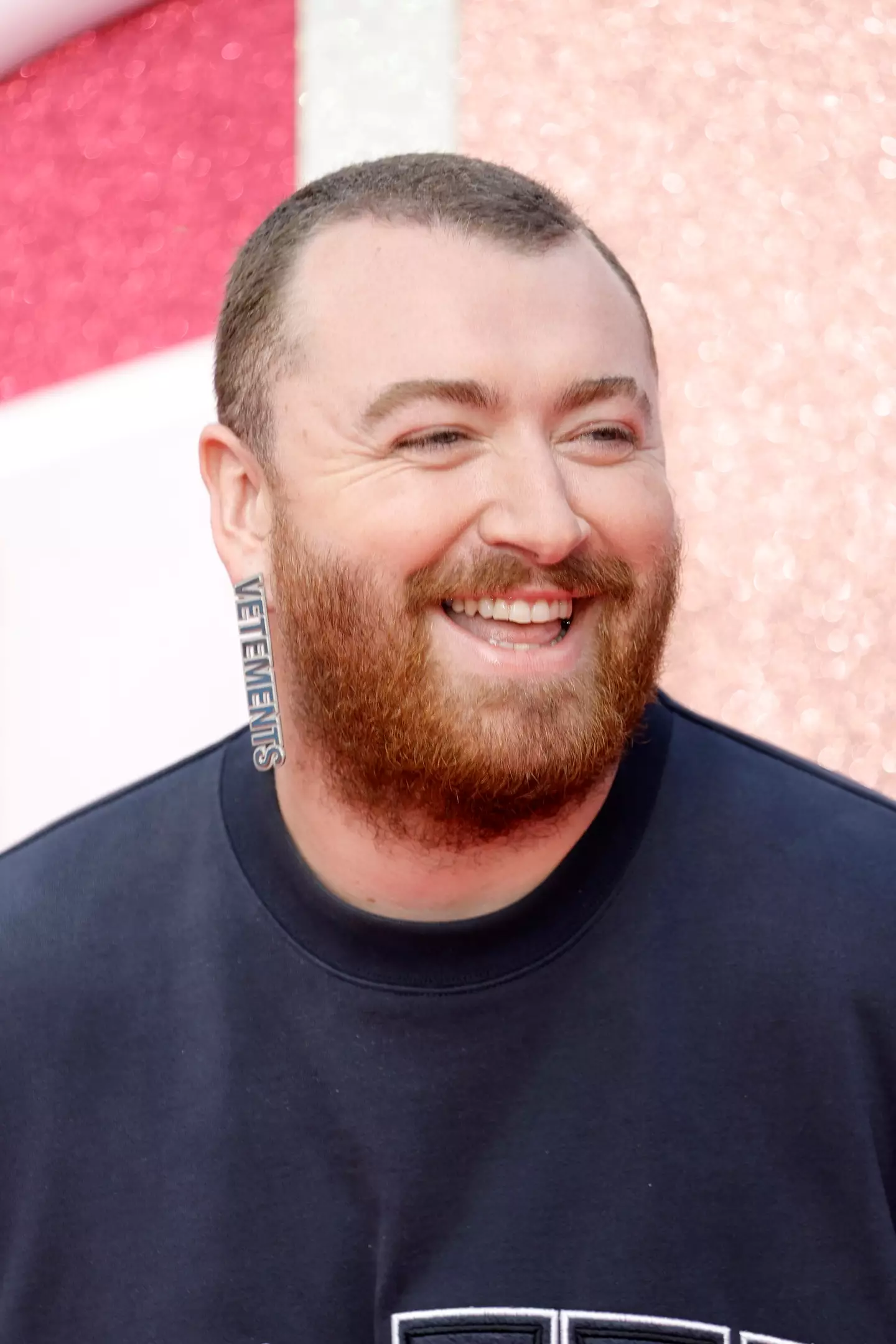 Sam Smith appeared on the pink carpet last night.