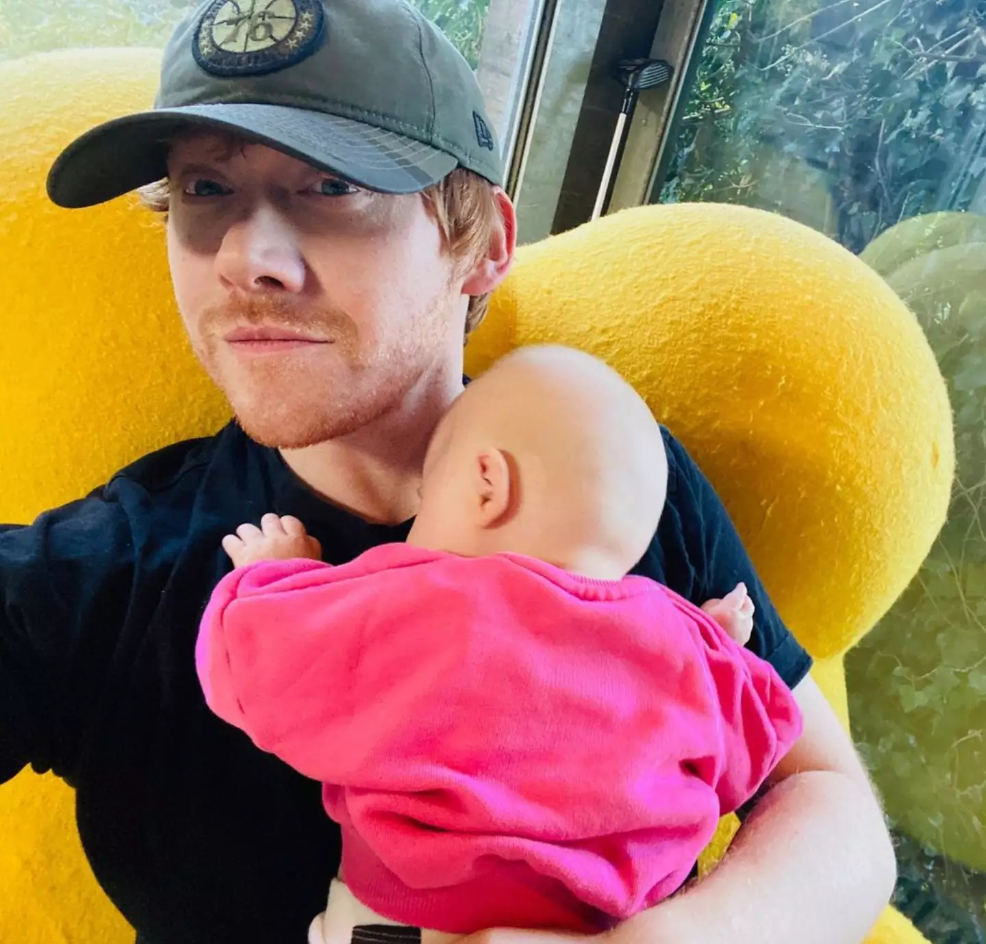 Rupert Grint with his daughter, Wednesday.