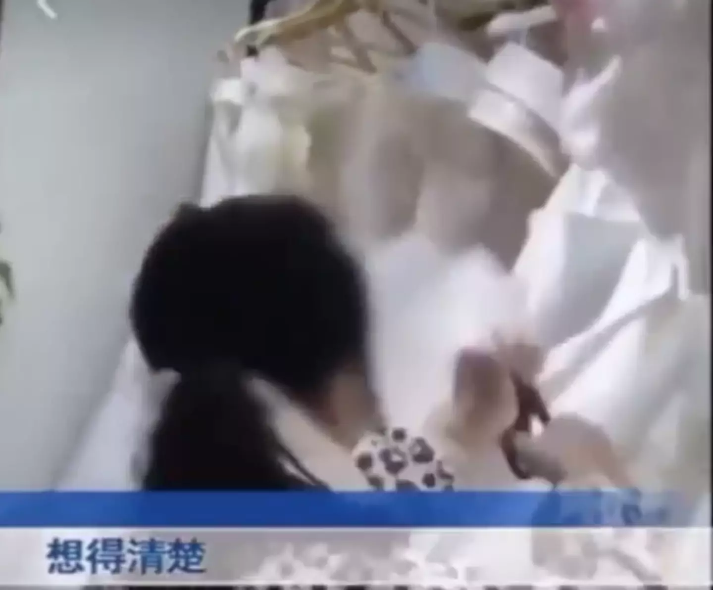 The woman snipped through white bridal gowns (