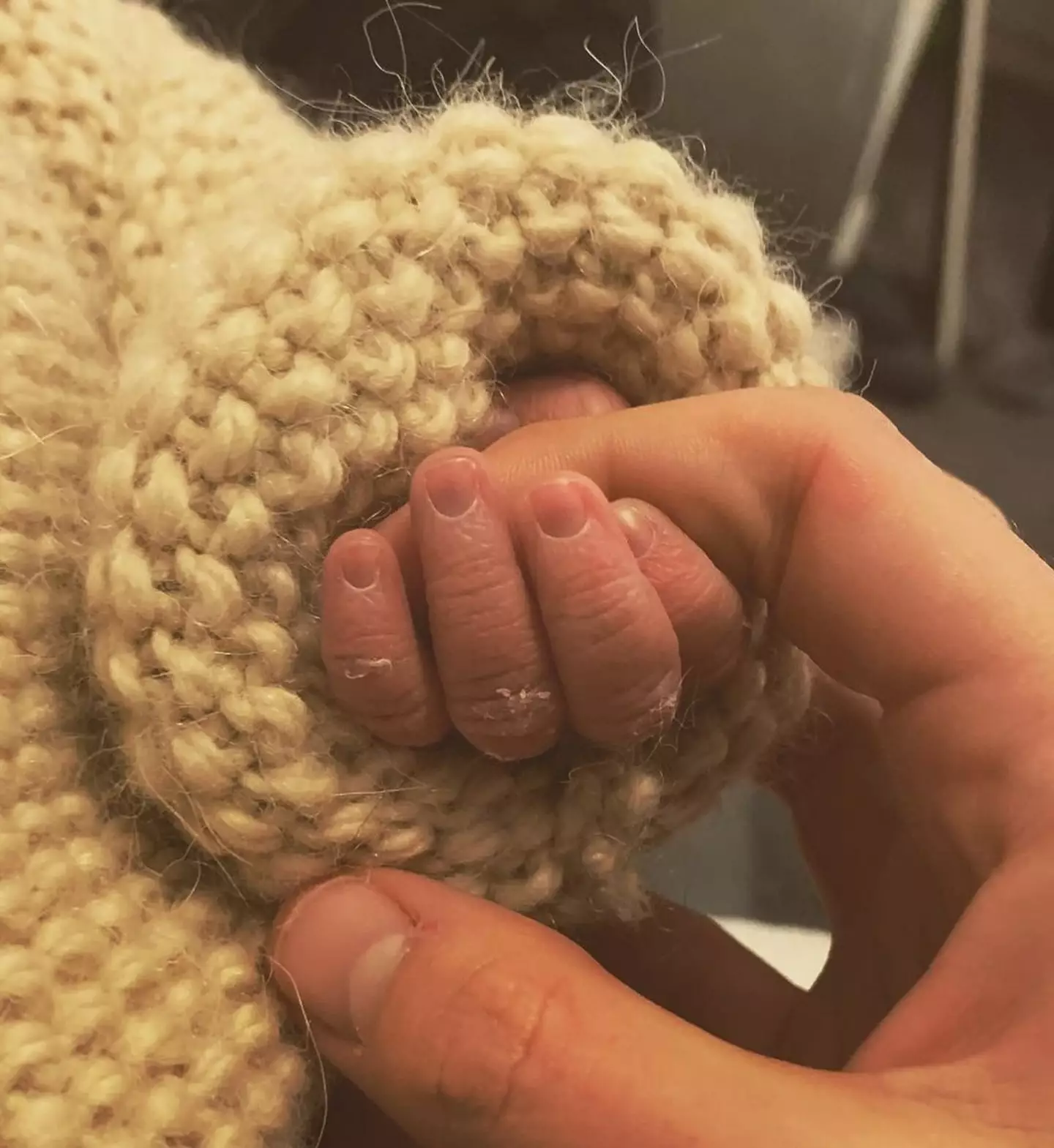 Jess shared a sweet snap of the newborn's hand to Instagram.