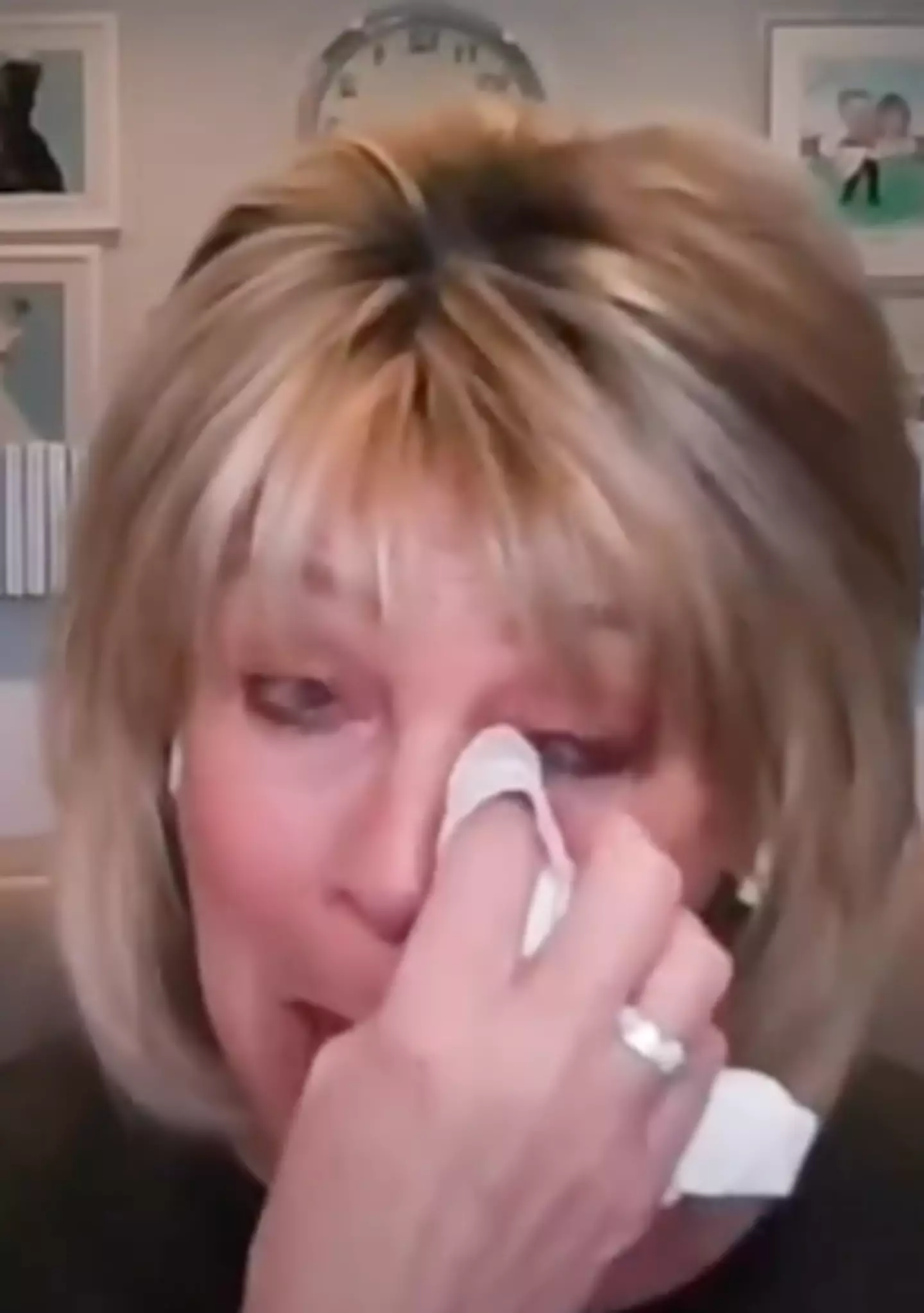 She broke down in tears while discussing her son.