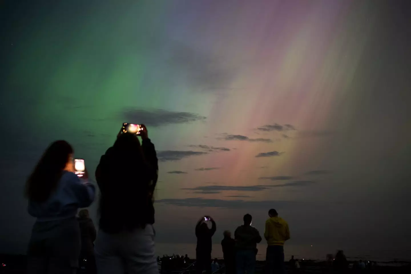 There are specific setting you can follow to best capture the Northern Lights on your phone camera (Ian Forsyth / Stringer / Getty Images)