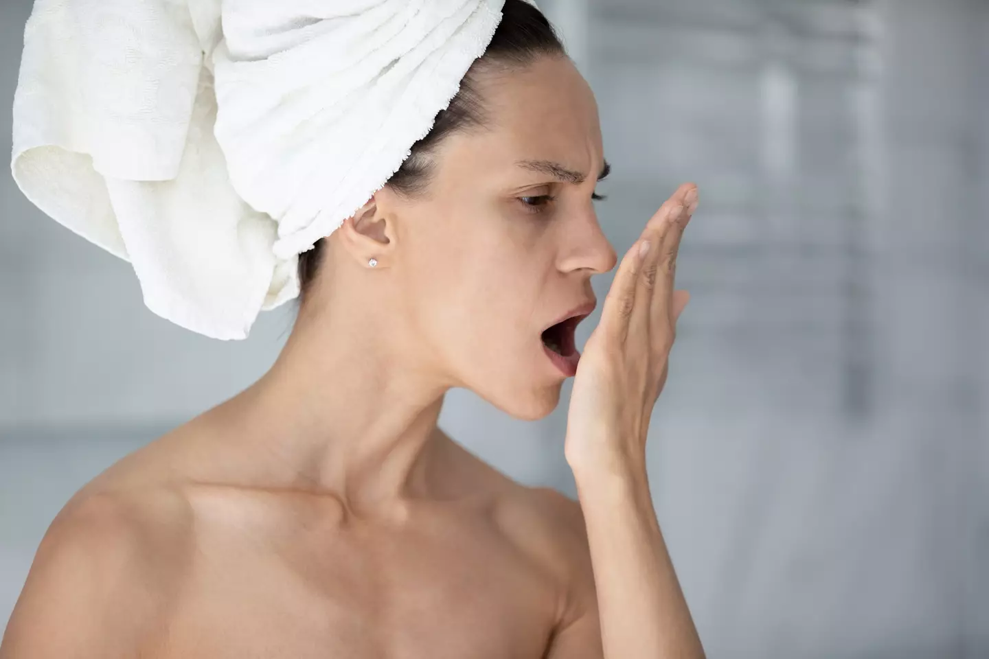 A dentist has given some reasons why you may wake up with bad breath in the morning (Getty Stock Images)