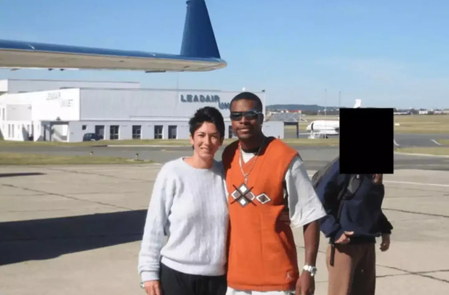 Chris Tucker is seen posing with Ghislaine Maxwell (Department of Justice)