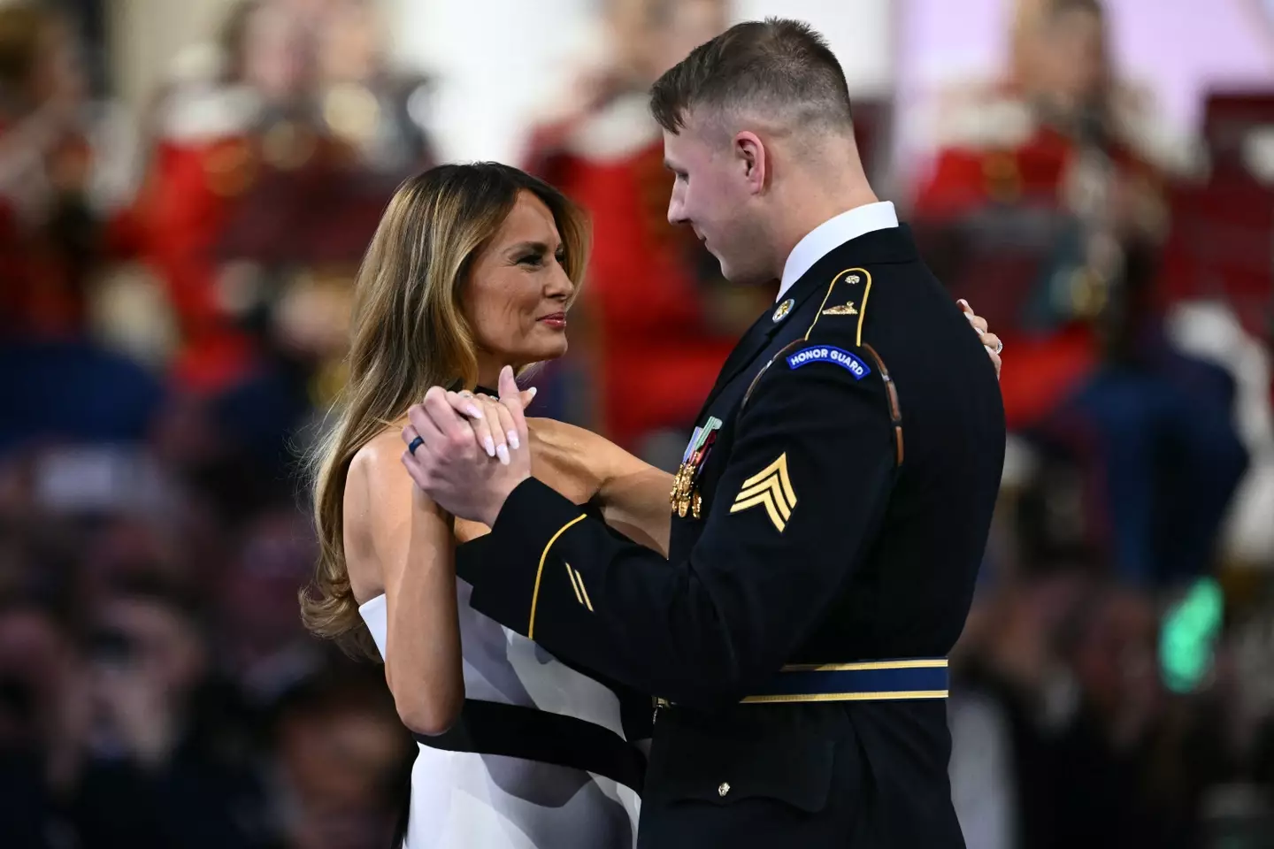 Melania was invited to dance by the army man (PATRICK T. FALLON/AFP via Getty Images)