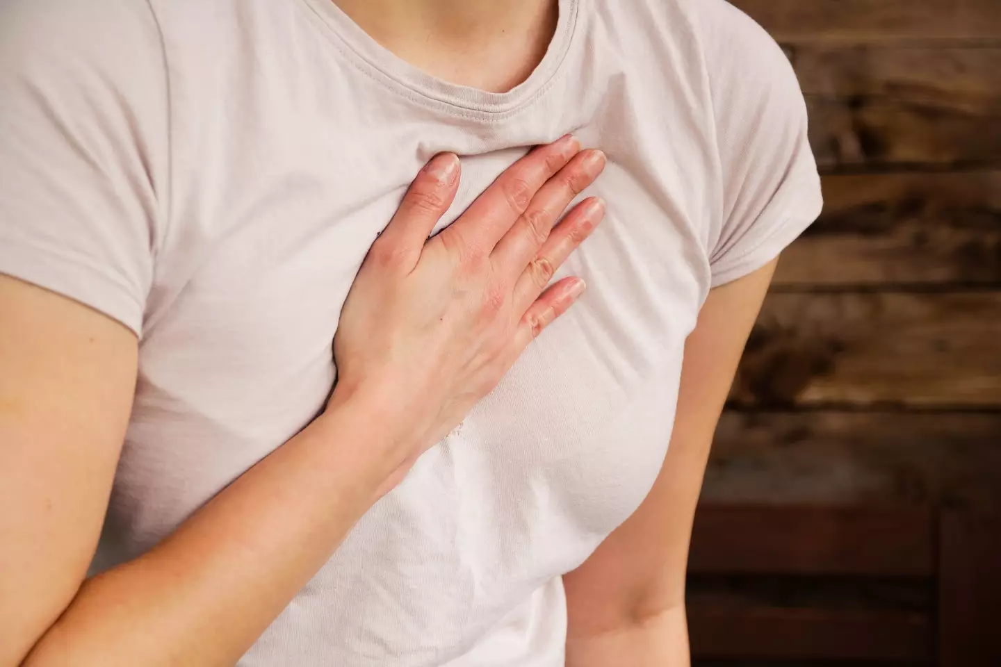 Heart palpitations are another key sign that the heart is 'struggling to function normally' (Kinga Krzeminska / Getty Images)
