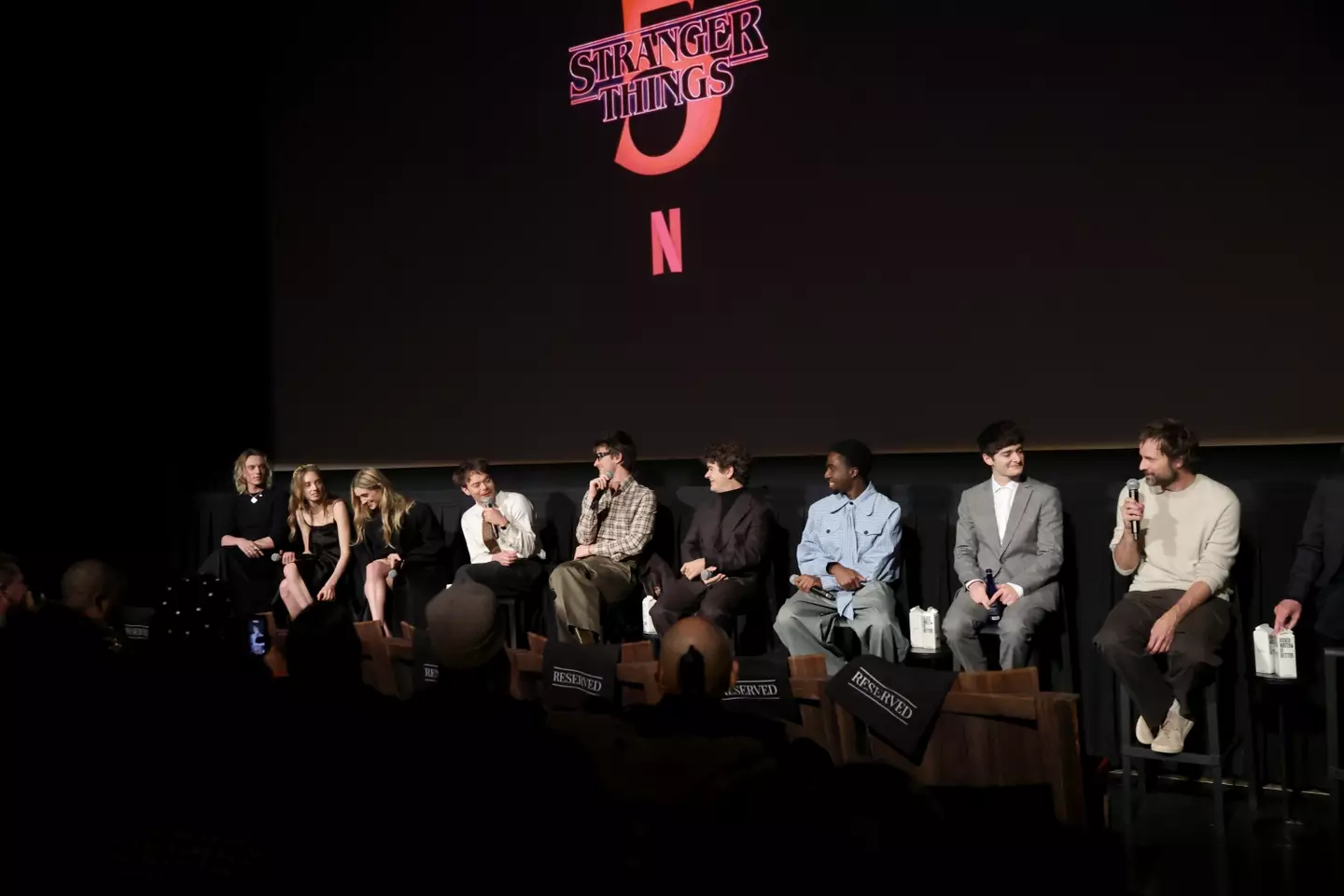 The rest of the cast gathered together at a Q&A and screening the week before without Millie (Photo by Mike Coppola/Getty Images for Netflix)