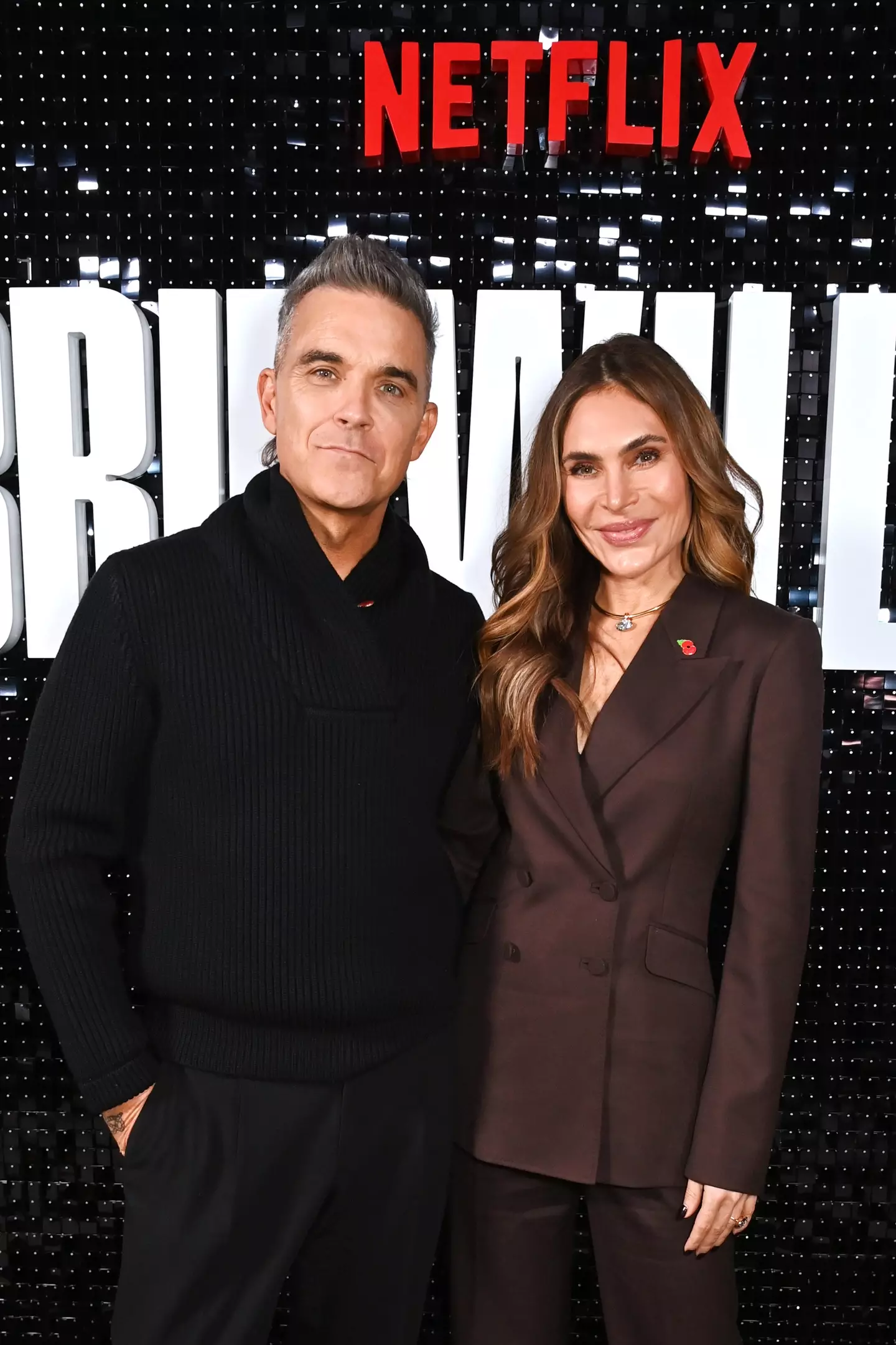 Robbie Williams with wife Ayda Field.