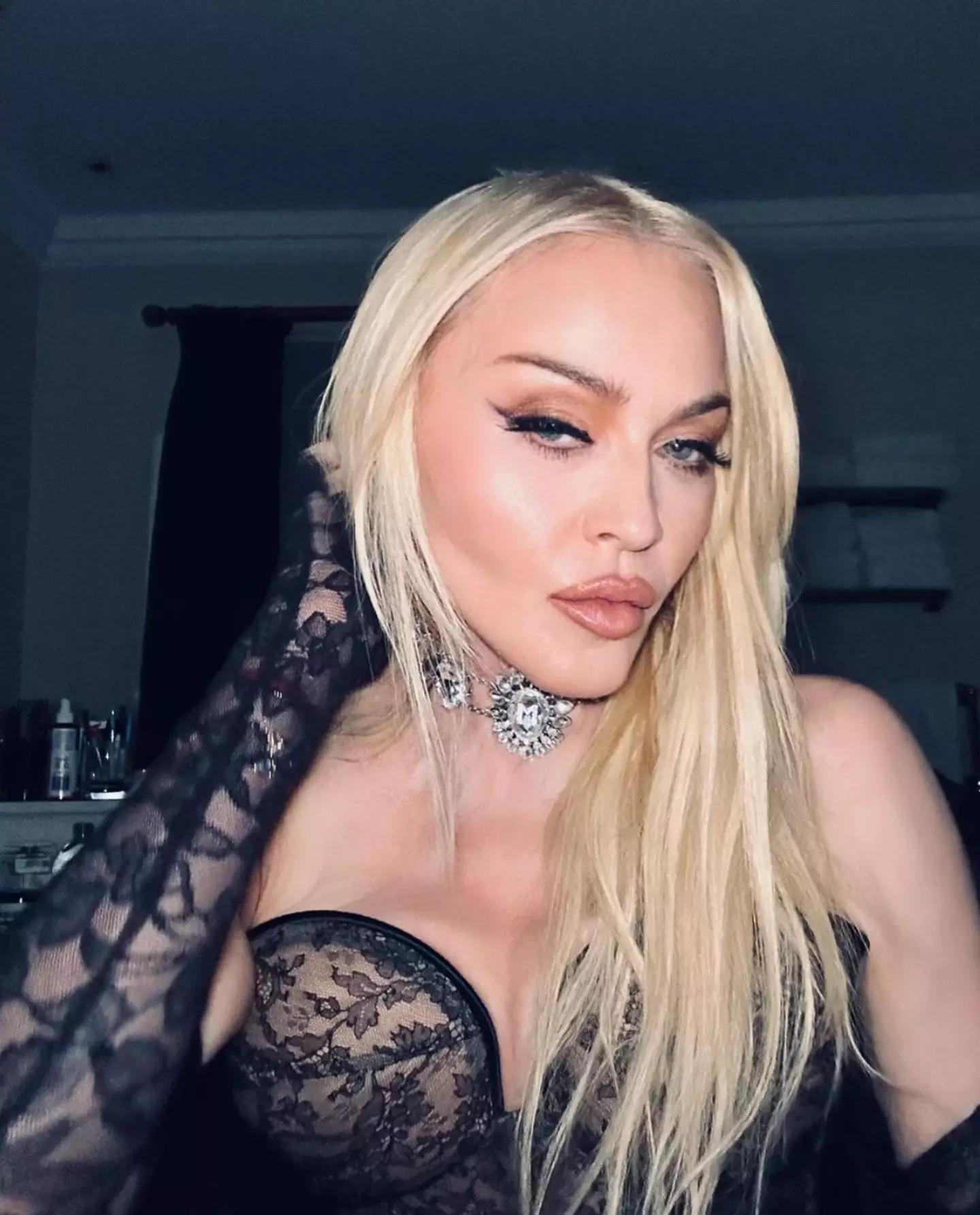 Madonna's family say she'd been working too hard ahead of her health scare.