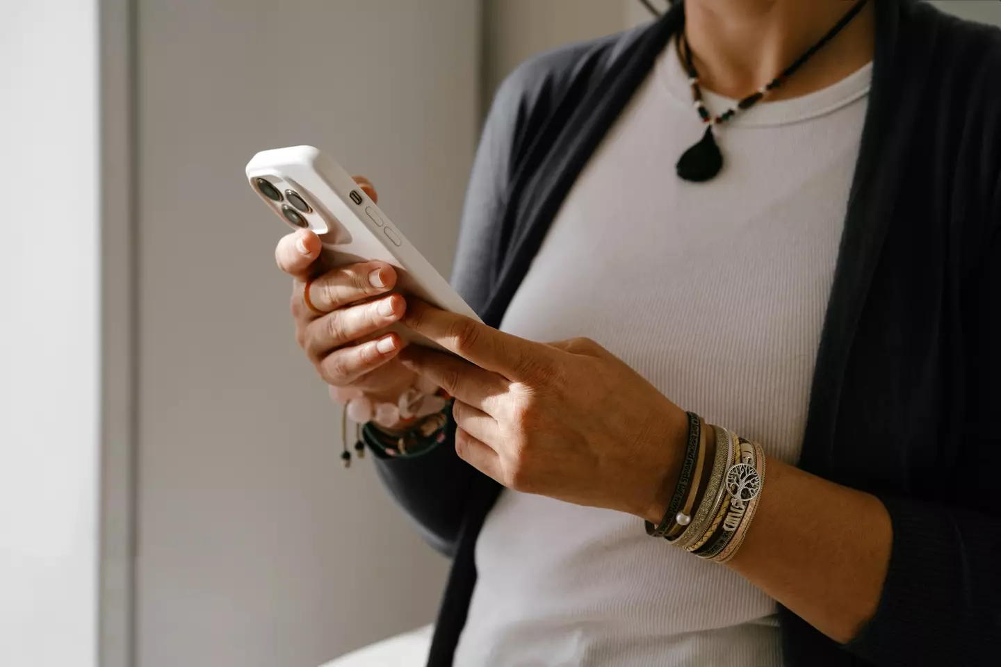 Ever felt your iPhone vibrate, only for there to be no notifications? (Getty Stock Image)