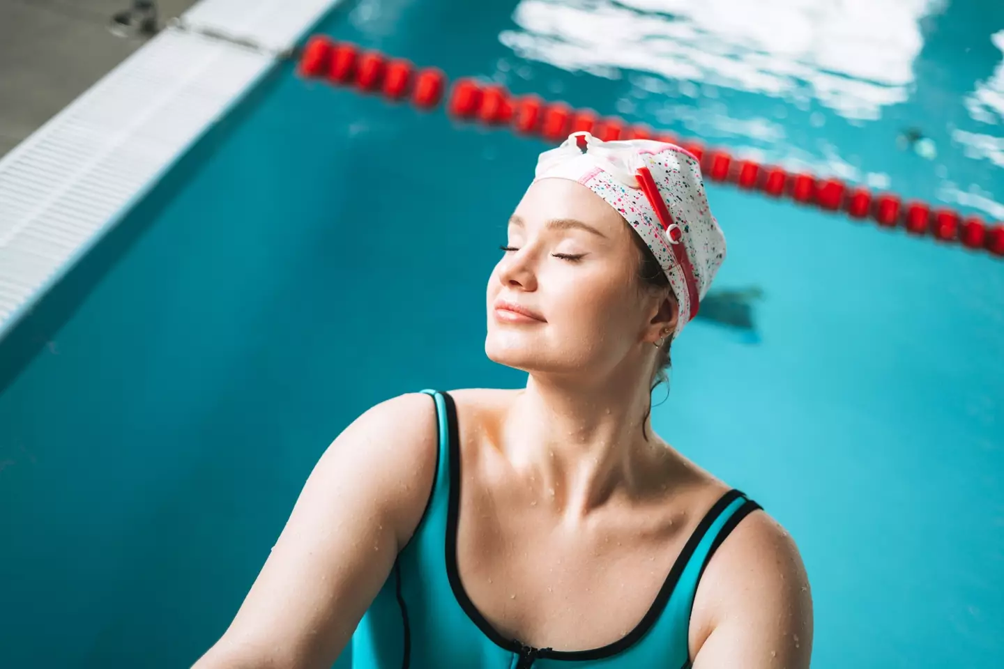 Swimming caps weren't made to keep your hair dry. (Getty/Galina Zhigalova)