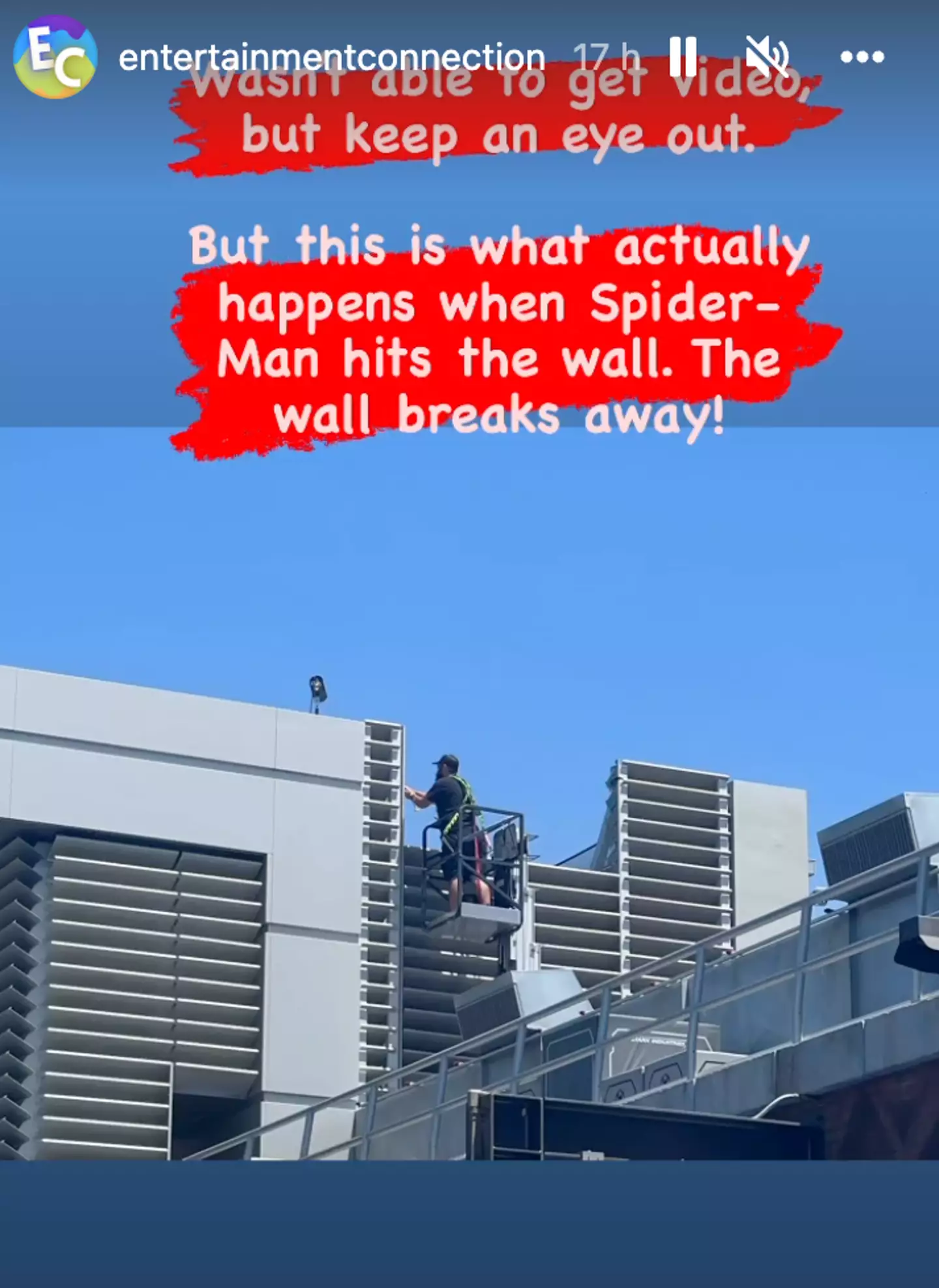 Crew members worked to fix the wall after Spider-Man's crash.