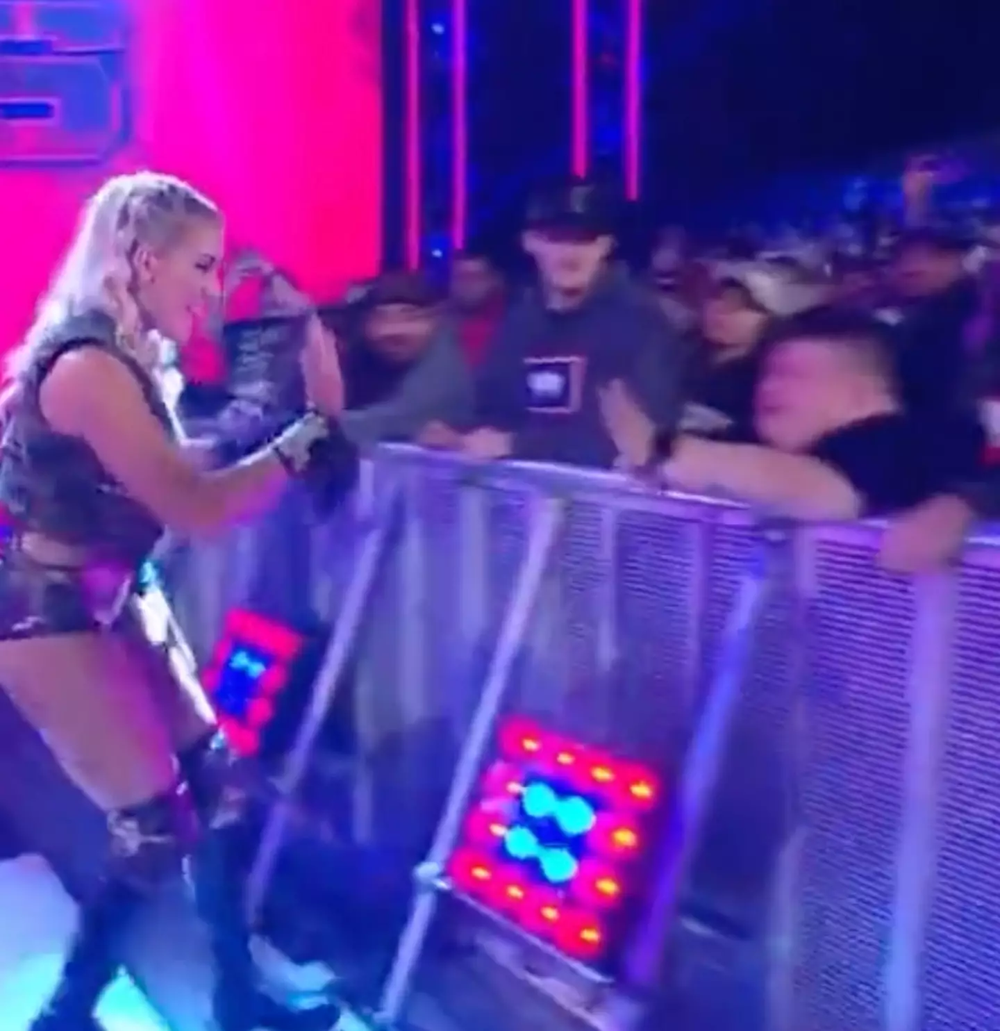 Lacey Evans went to give the fan a high five.