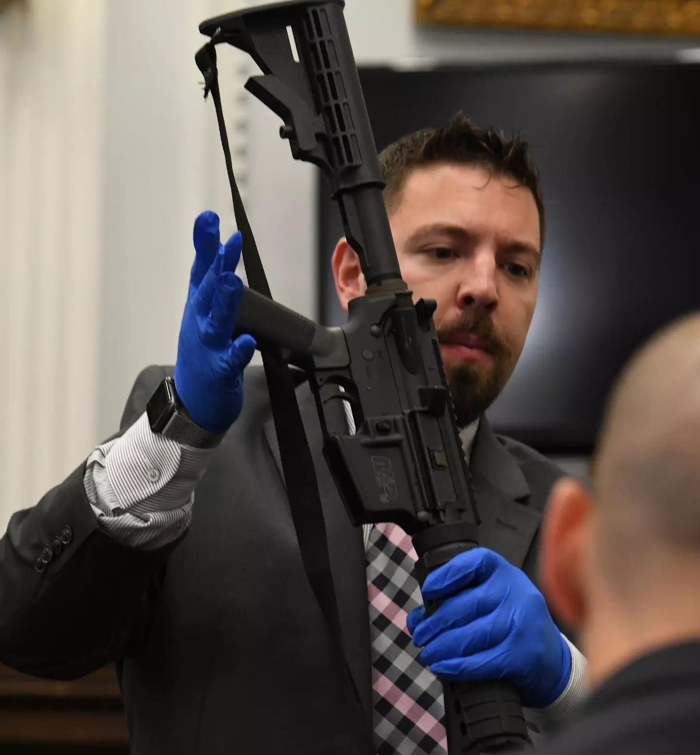 Kyle Rittenhouse's rifle being shown in court (Alamy)