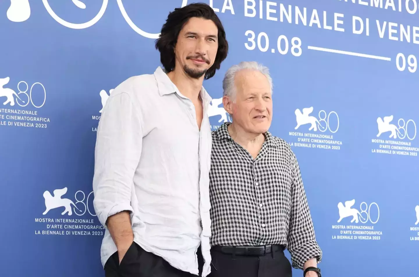 Adam Driver and director Michael Mann attend a photocall for the movie 'Ferrari'.