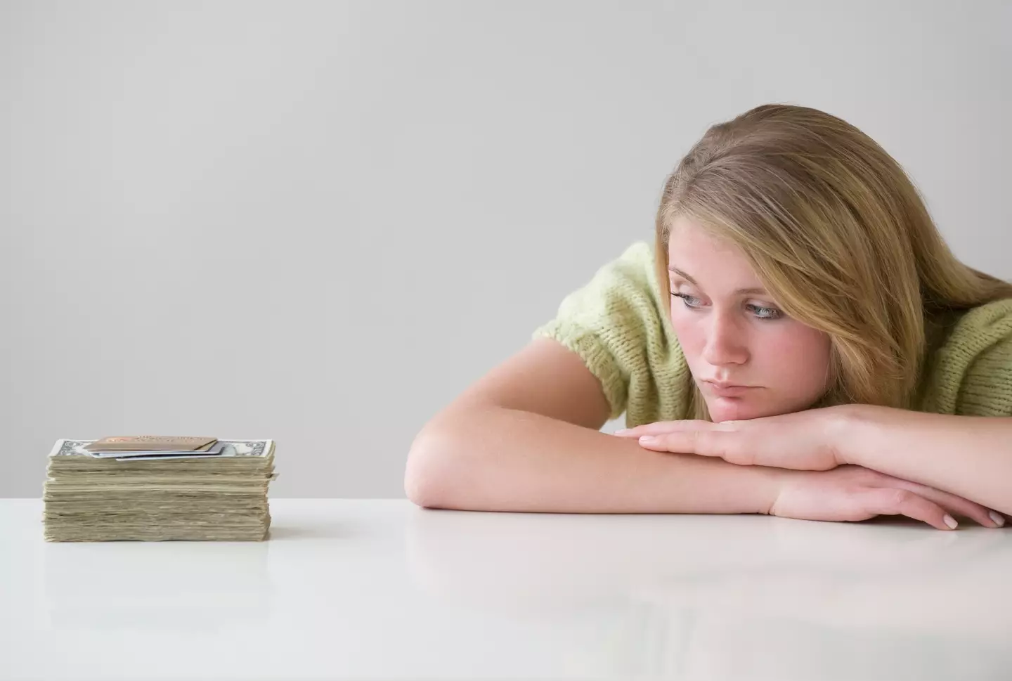 Despite living everyone's fantasy, the 28-year-old lottery winner believes it was really a curse (Getty stock)